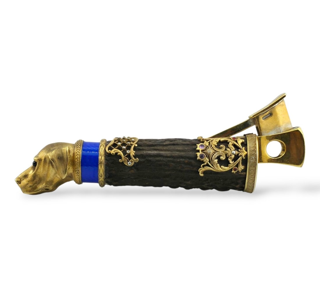 Russian 84 gilt silver sculptural cigar cutter: A Russian 84 gilt silver sculptural cigar cutter. The body of the piece is made of natural materials imitating wood, garnished with overlay and diamonds. White guilloche enamel band. The finial is mad