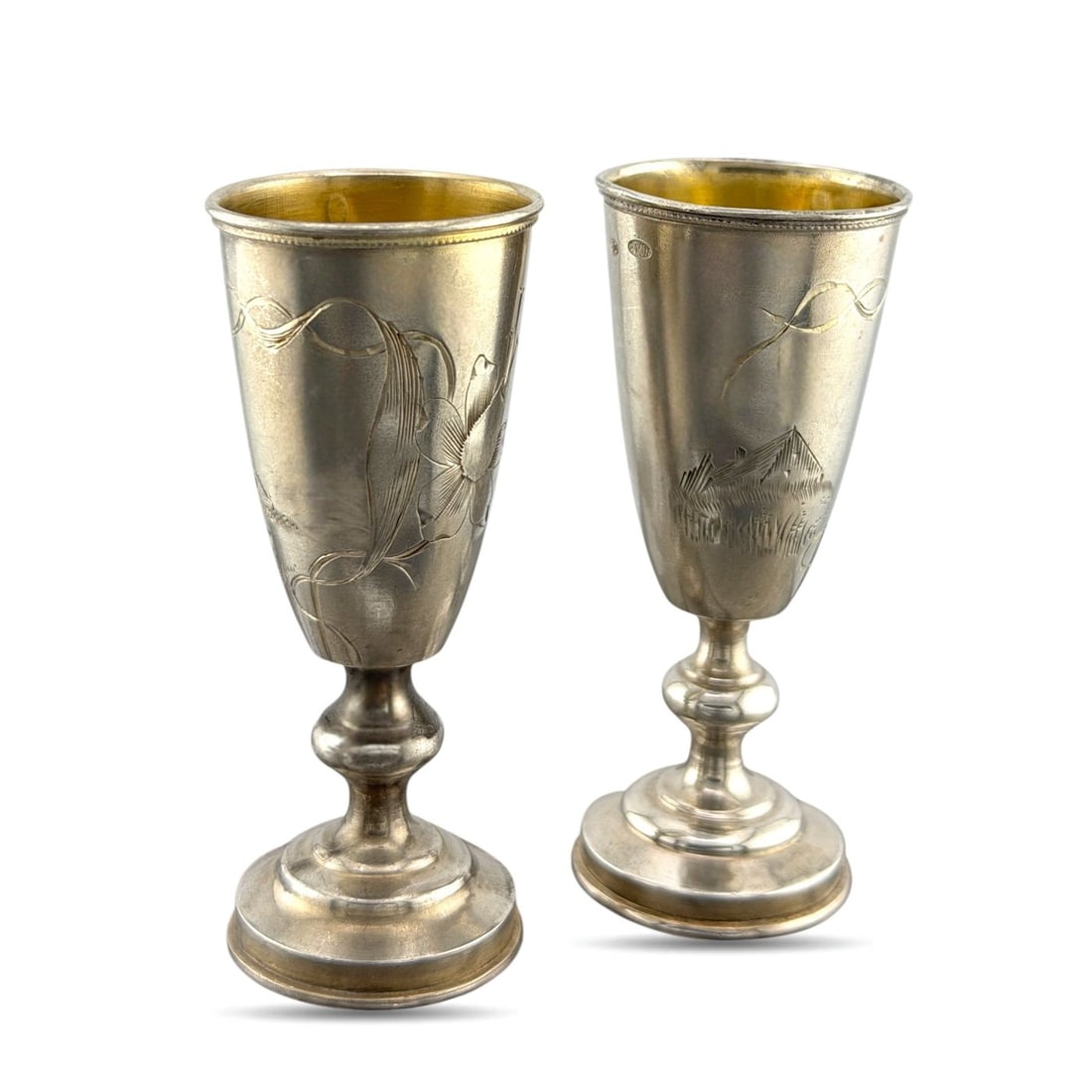 Imperial Russian 84 Zolotnik Silver Pair of Antique Cups: Imperial Russian 84 Zolotnik Silver Pair of Antique Cups This refined pair of antique Russian silver cups is crafted in the traditional 84 zolotnik silver standard, equivalent to .875 silver. The cups