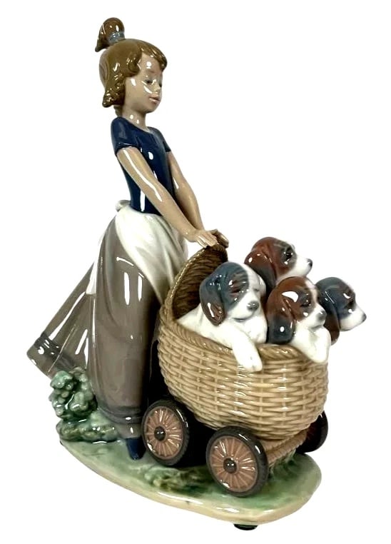 LLADRO LITTER OF FUN - OPEN BOX PORCELAIN FIGURINE 5364G: LLADRO LITTER OF FUN - OPEN BOX PORCELAIN FIGURINE 5364GLladro porcelain figurine titled 'Litter of Fun,' model number 5364. Features a young girl pushing a cart filled with puppies. Glazed finish wit
