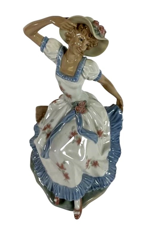 LLADRO NAO Dancing Lady Rare Daisa Spain: LLADRO NAO Dancing Lady Rare Daisa SpainLladro NAU porcelain figurine titled 'Daisy,' dated 1978. The piece measures approximately 11.5 inches tall. Features a young woman in a flowing floral dress wi