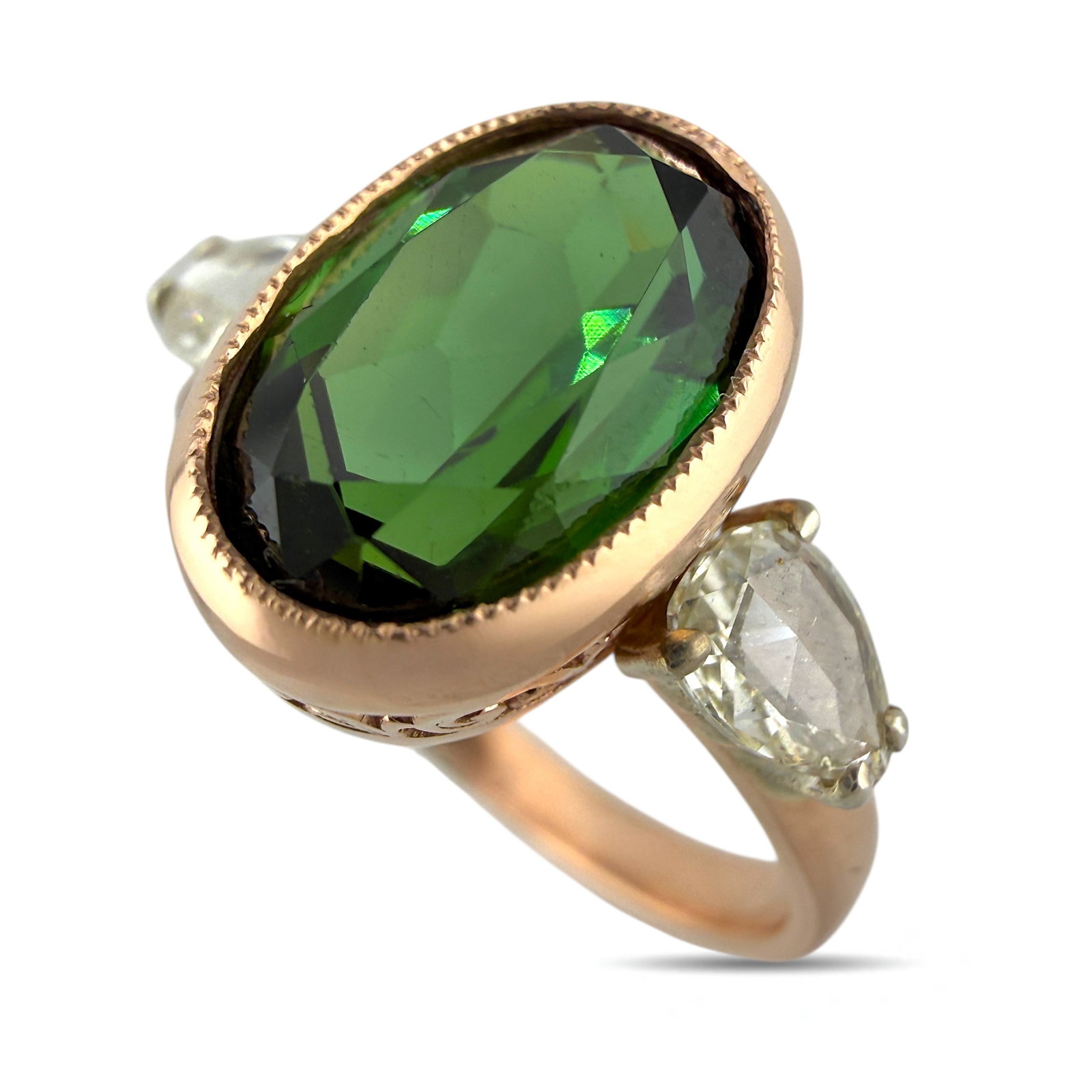 Imperial Russian 14K Rose Gold 2.3ct Tourmaline and Diamond Ring: Imperial Russian 14K Rose Gold 2.3ct Tourmaline and Diamond Ring Crafted in warm Russian 14 karat rose gold, this elegant ring features a vibrant oval cut tourmaline at its center, beautifully framed 