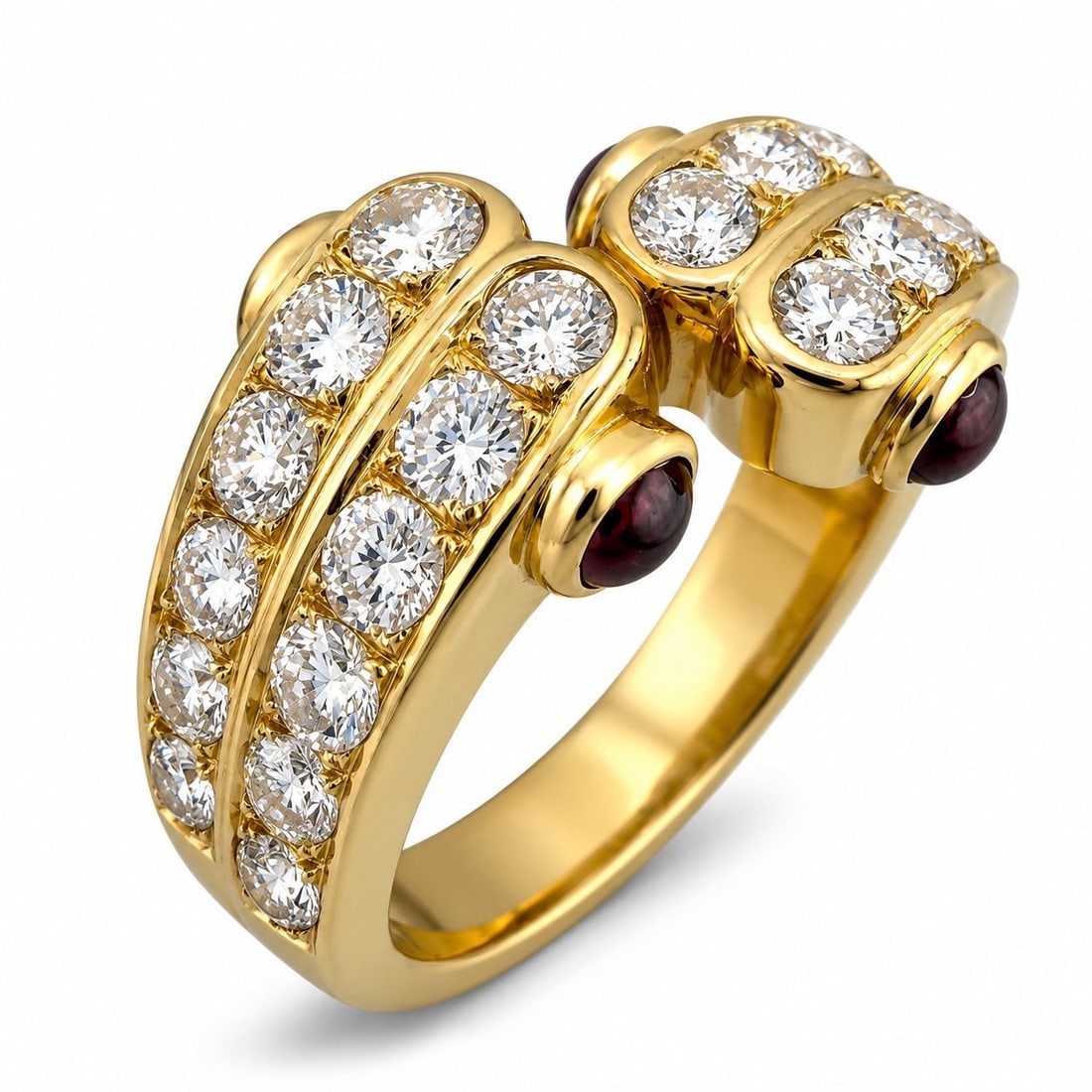 18K Yellow Gold 1.40ct Diamond and 0.40ct Ruby Bypass Ring: 18K Yellow Gold 1.40ct Diamond and 0.40ct Ruby Bypass Ring A graceful 18 karat yellow gold ring designed with two sides of the band sweeping toward the center in an off center bypass style,