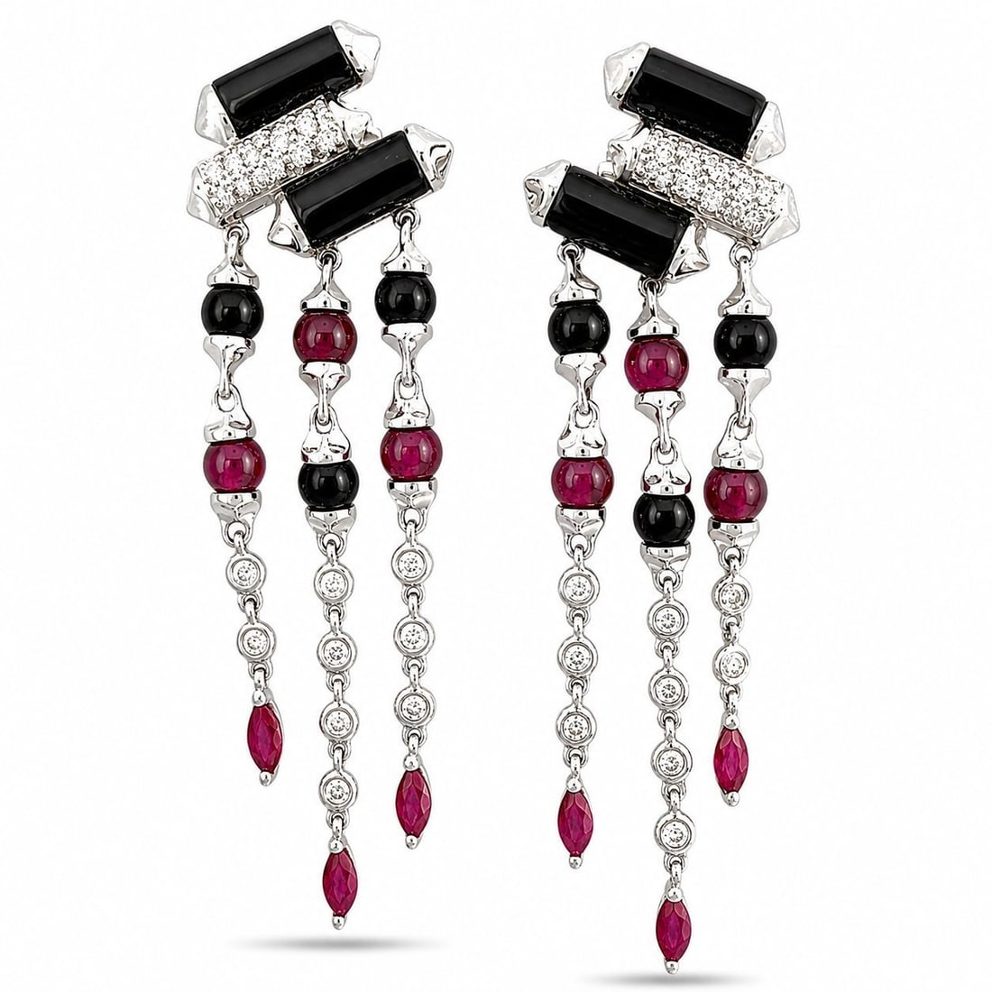 18K & 14K White Gold 0.55ct Diamond Ruby and Onyx Dangle Earrings: 18K White Gold 0.55ct Diamond, Ruby and Onyx Dangle Earrings A distinctive pair of 18K white gold earrings featuring an elegant three-strand dangle design. Each earring is composed of three articulate