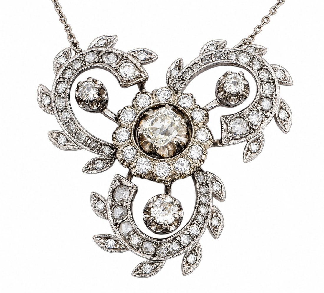 Antique 18K White Gold Celeste Rotating Diamond Halo Necklace: Antique 18K White Gold Celeste Rotating 3.5ct Diamond Halo Necklace Crafted in luminous 18K white gold, this captivating necklace features a rotating emerald-cut diamond at its heart—a mesmerizing f