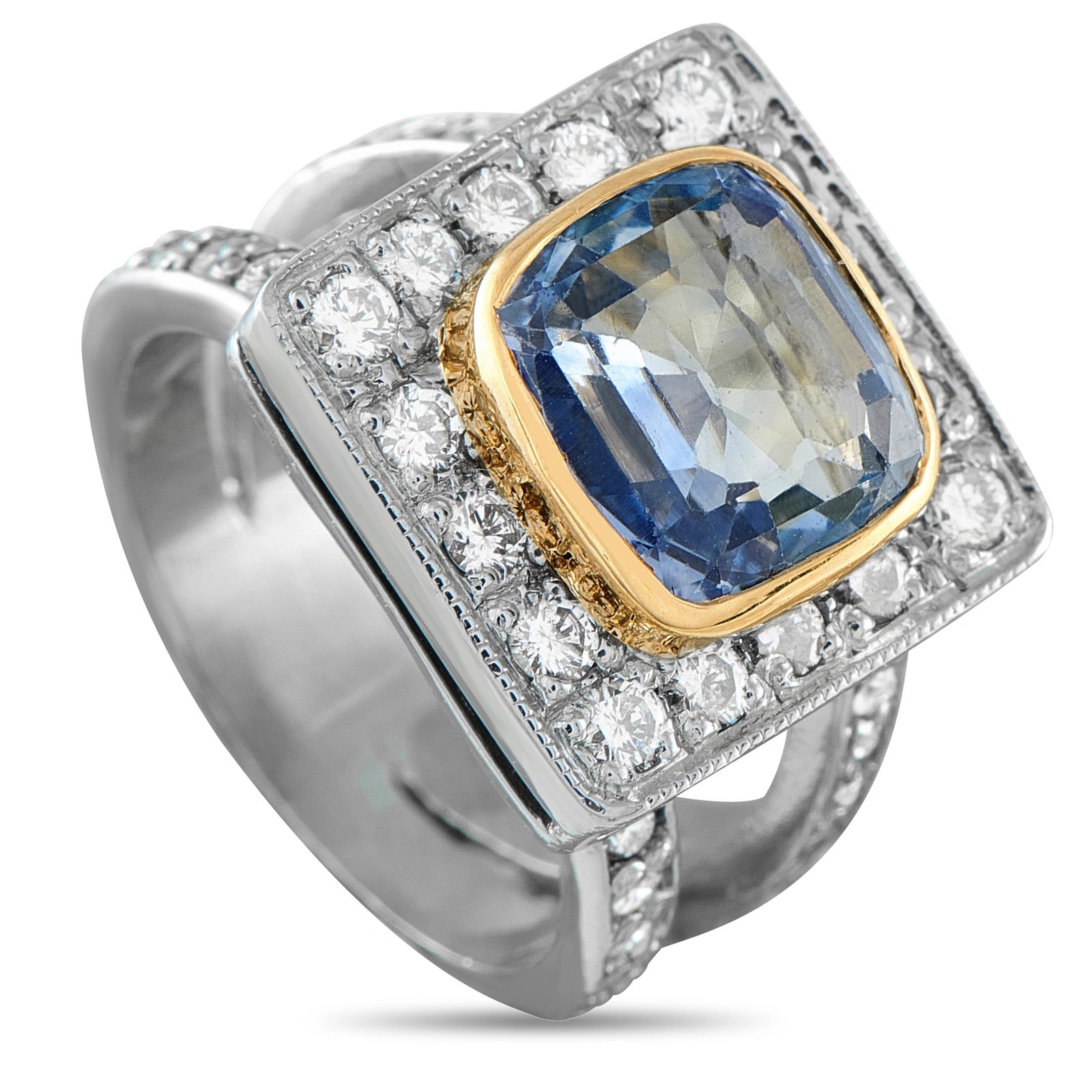 18K White Gold 0.96ct Diamond and Sapphire Cocktail Ring: A striking cocktail ring in 18K white gold, centering a cushion-cut blue sapphire of approximately 3.10 carats set in a warm yellow gold bezel, surrounded by a frame of round brilliant diamonds