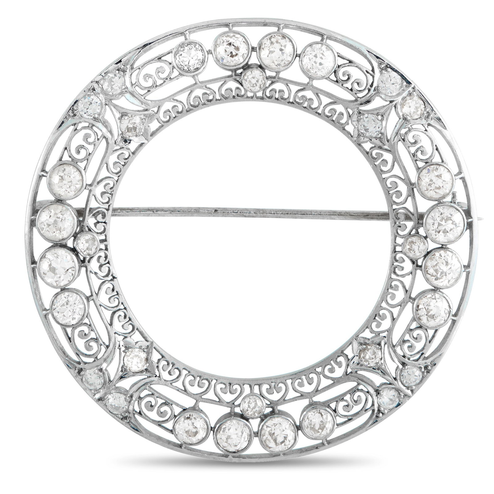 Platinum 3.75ct Diamond Wreath Brooch: A continuous ring of light. This Edwardian-style brooch is designed like a wreath, with lace-like filigree, pierced and patterned with repeating motifs. Round diamonds are embedded in smooth, circular