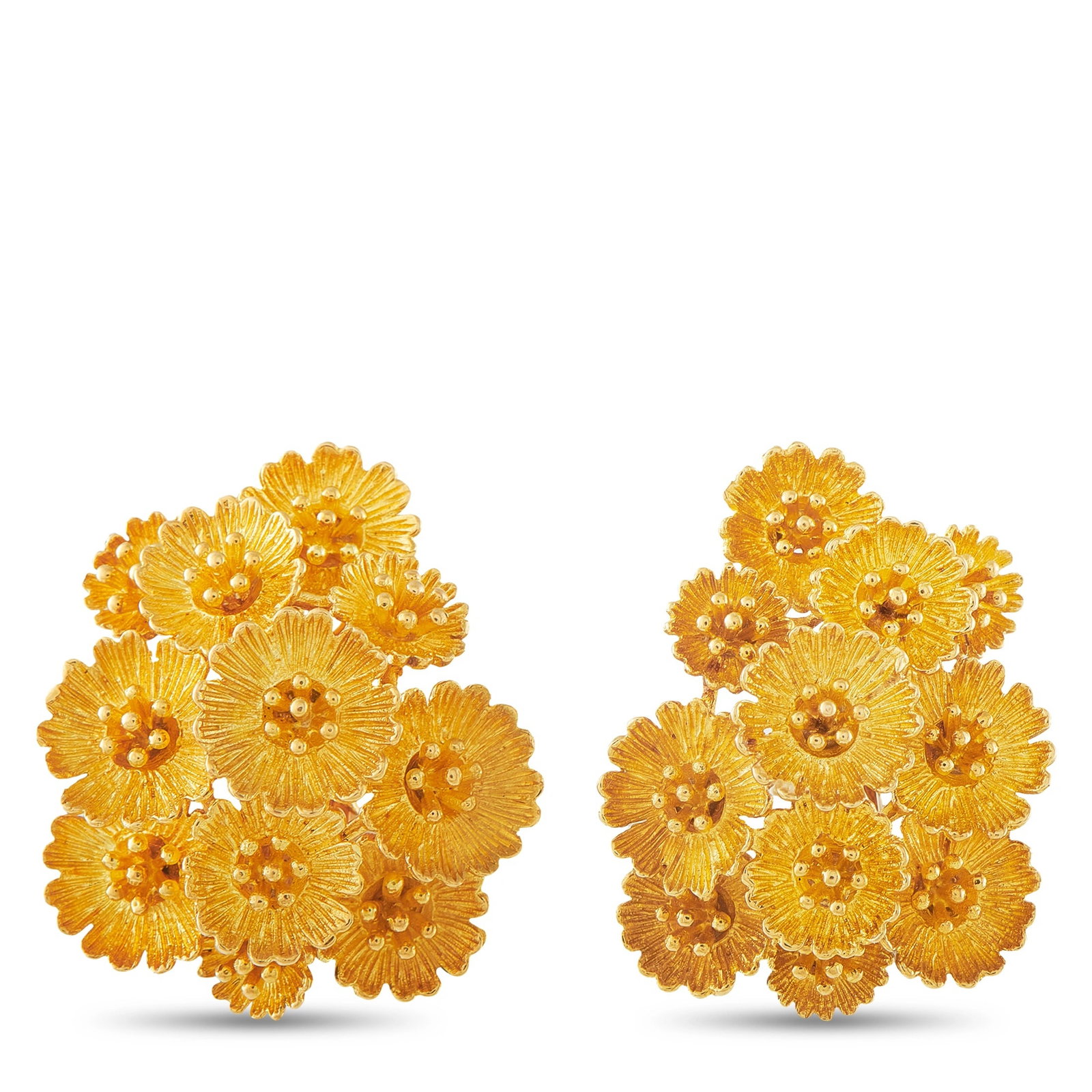 Van Cleef & Arpels Vintage 18K Yellow Gold Floral Clip: These vintage Van Cleef & Arpels earrings are crafted in textured 18K yellow gold, designed as clustered floral blossoms with a domed, sculptural silhouette. Each earring is fitted with a clip-on back