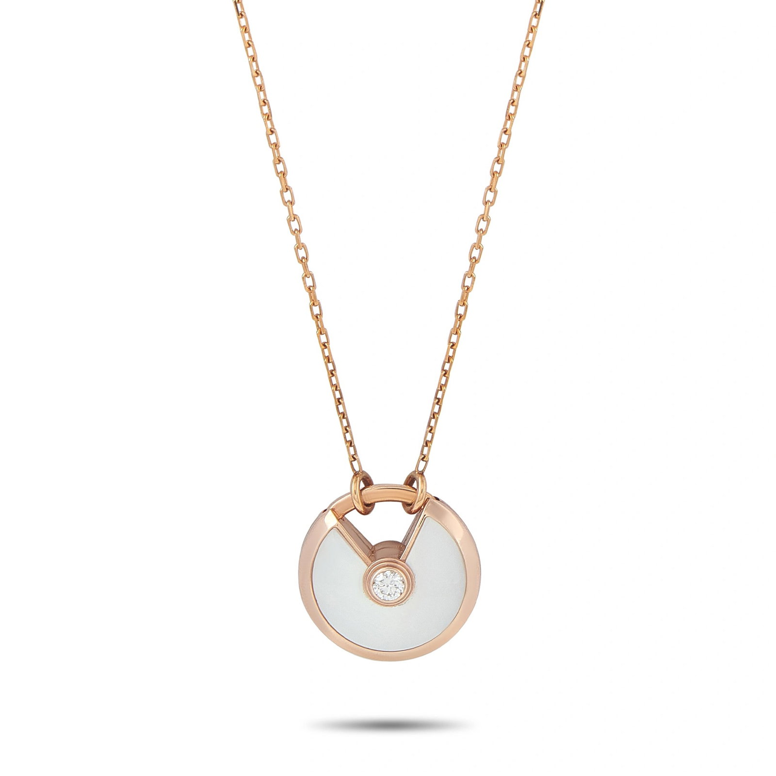 Cartier Amulette de 18K Rose Gold Diamond and Mother of Pearl Pendant: This Cartier Amulette de Cartier necklace is crafted in 18K rose gold, featuring a round mother-of-pearl medallion centered with a single bezel-set round diamond. The necklace measures approximately 2