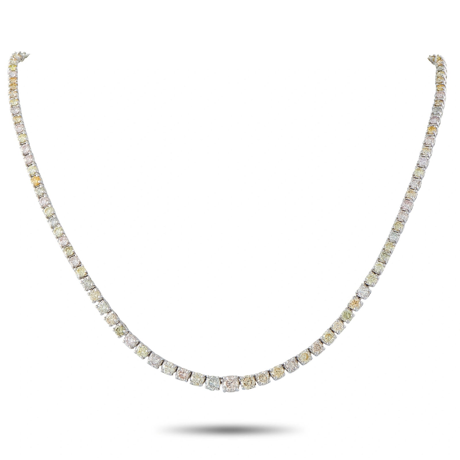 Exclusive 18K White Gold 11.0ct Fancy Color Diamond Tennis Necklace: This eye-catching tennis necklace is crafted in 18K white gold and set with 11.00 carats of round brilliant diamonds in natural fancy shades of gray, pinkish brown, and brownish yellow, GIA certified 