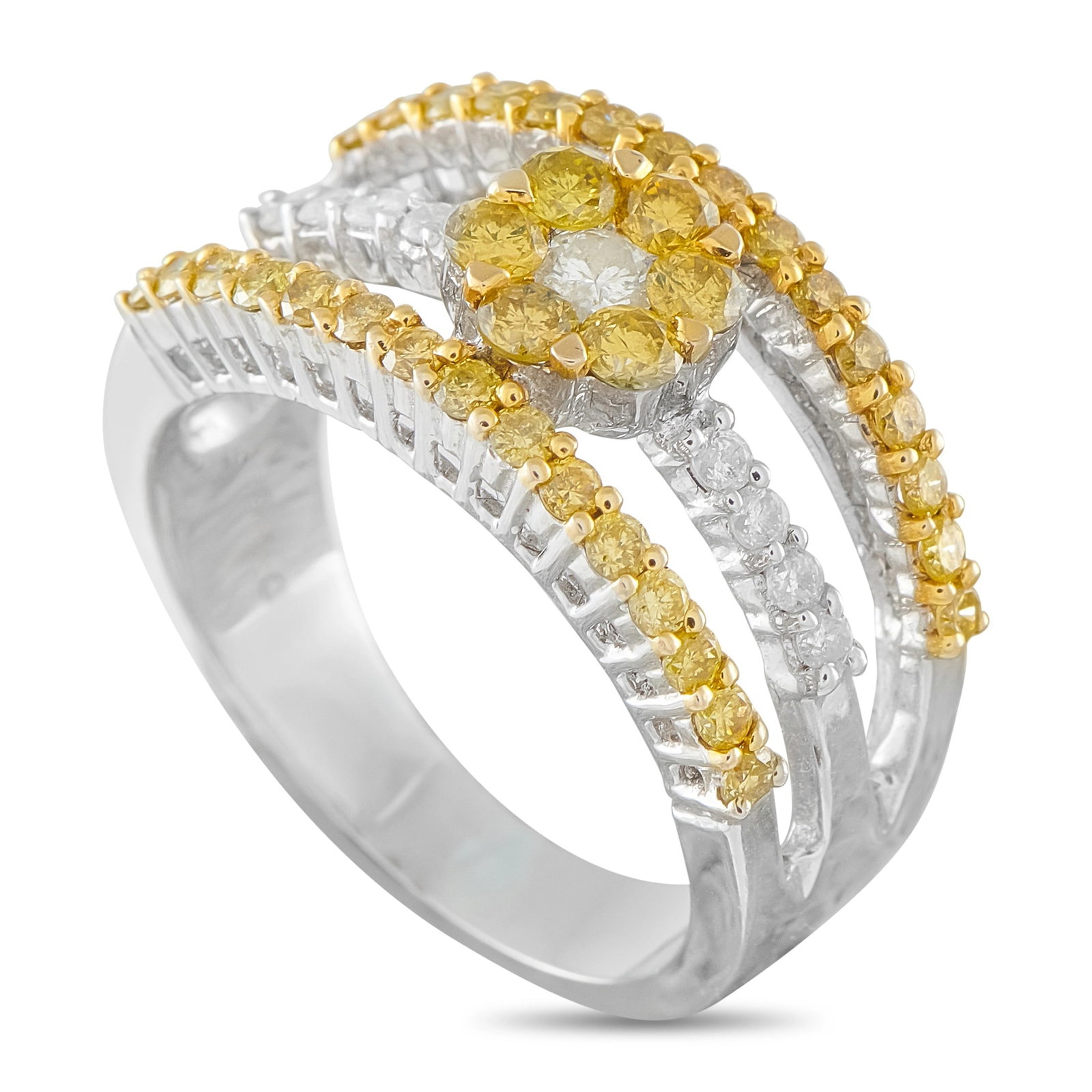 Exclusive 18K White Gold 1.10ct Fancy Yellow and White Diamond Ring: This estate cocktail ring is crafted in 18K white gold and centers on a flower-shaped cluster of fancy yellow and white round brilliant diamonds. The cluster is framed by a multi-row crossover shank p