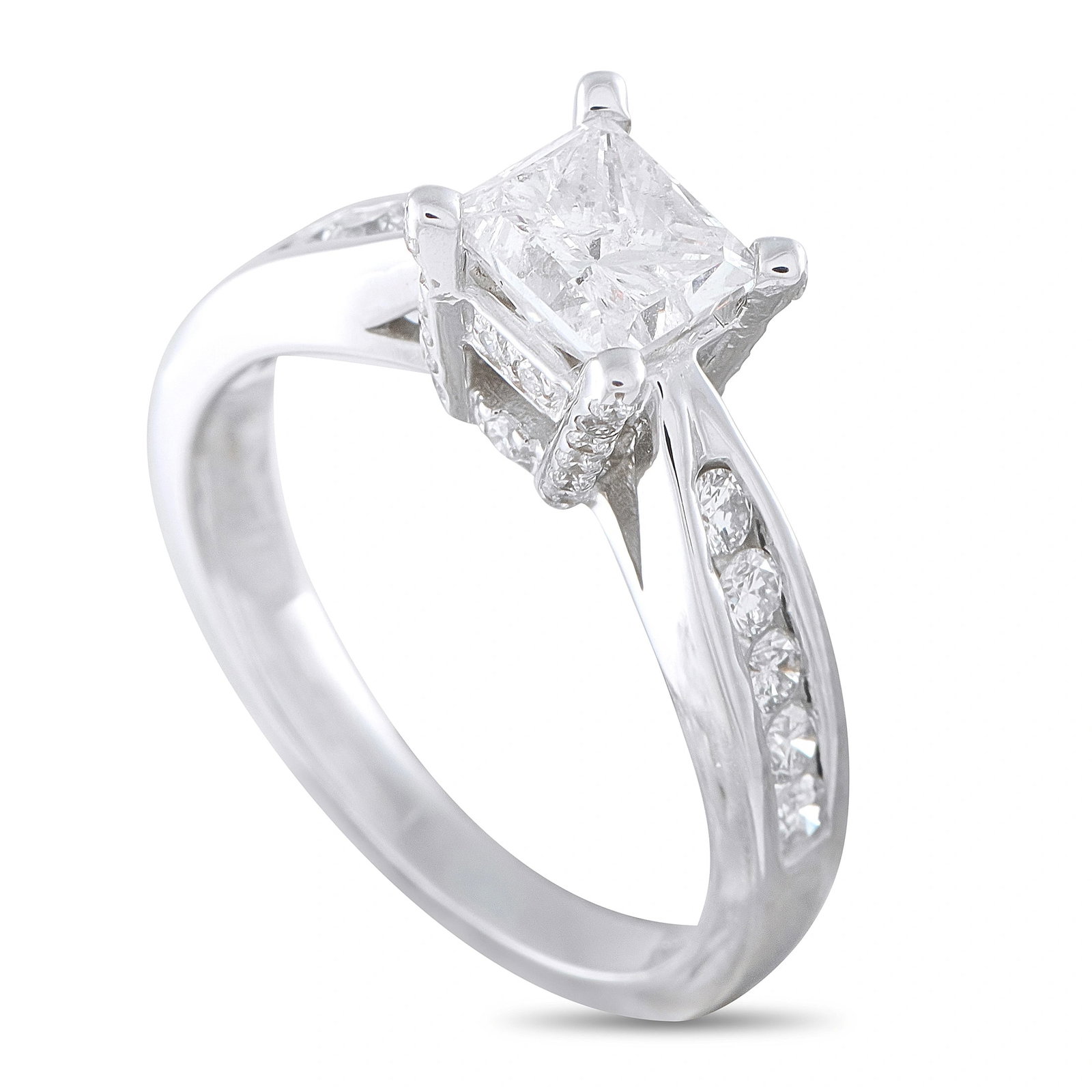 Exclusive 14K White Gold 1.38ct Diamond Ring: This Exclusive ring features a princess-cut center diamond weighing approximately 1.08 carats, set in a 14K white gold mounting with channel-set round diamond accents along the shoulders totaling appr
