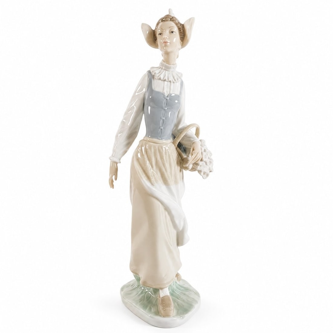 LLADRO #4860 Dutch Girl Glazed Porc. Figurine RETIRED: 1985: LLADRO #4860 Dutch Girl Glazed Porc. Figurine RETIRED: 1985LLADRO Graceful Dutch Girl porcelain Figurines, model number 4860, also known as Holandesa Airosa. This glazed polychrome piece depicts a you