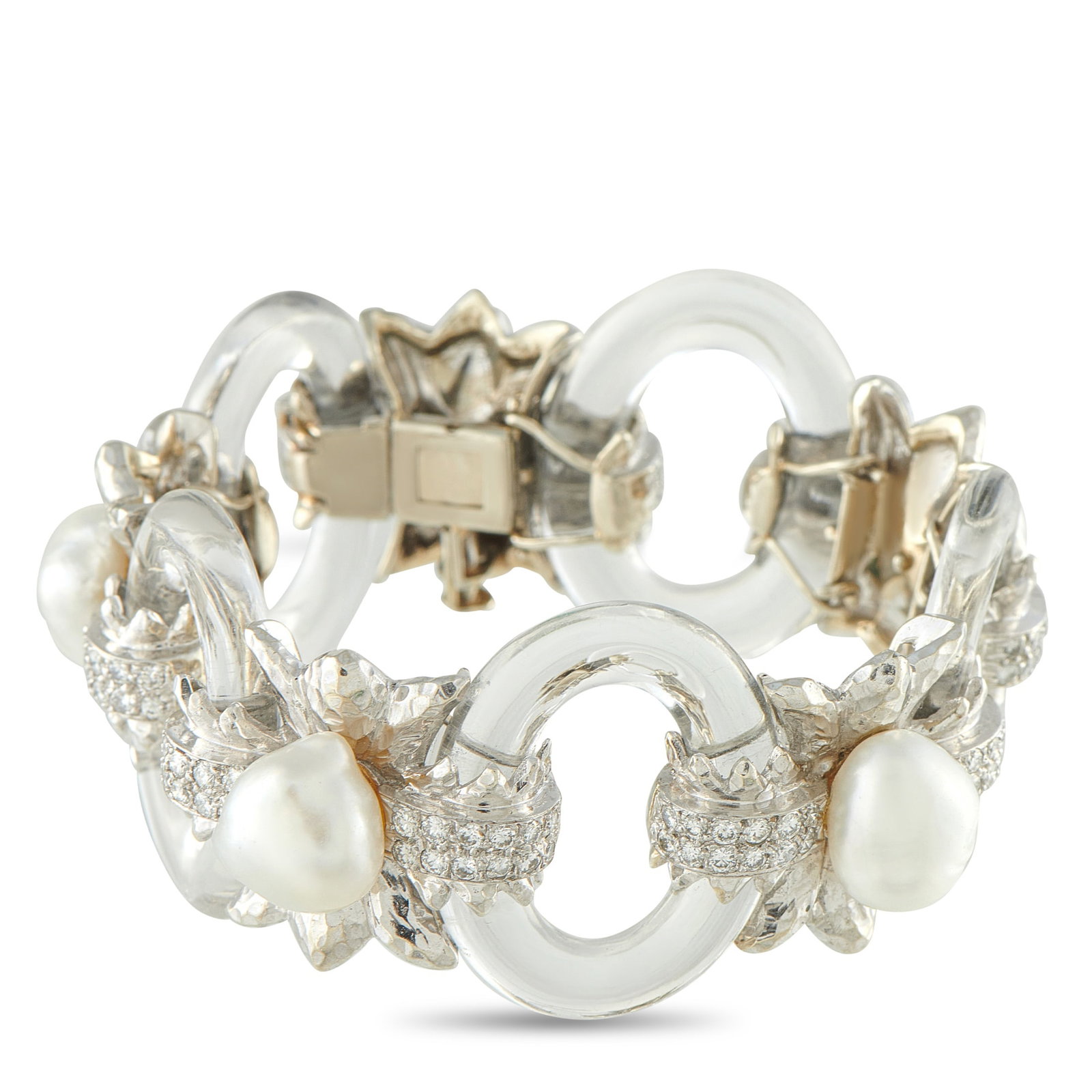 David Webb 18K White Gold and Platinum Rock Crystal and Pearl Bracelet: Here is a beautiful example of David Webb’s inventive elegance. This white gold and platinum bracelet features rock crystal rings arranged in an alternating pattern with floral motifs. A luminous ba