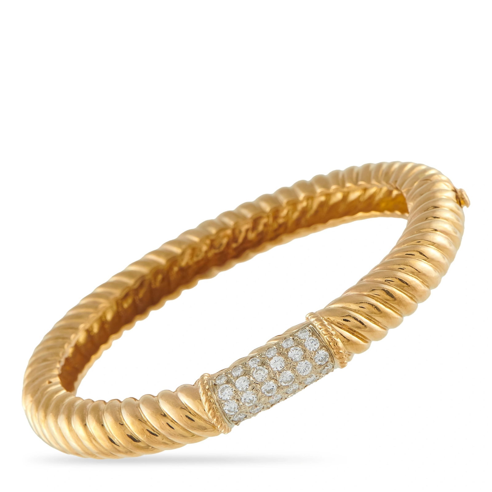 Van Cleef & Arpels Vintage 18K Yellow Gold Diamond Bracelet: Textured metalwork and sparkling Diamonds with a total weight of 1.25 carats come together in perfect harmony on this vintage Van Cleef & Arpels bracelet. Simple and elegant, it measures 6.50” l