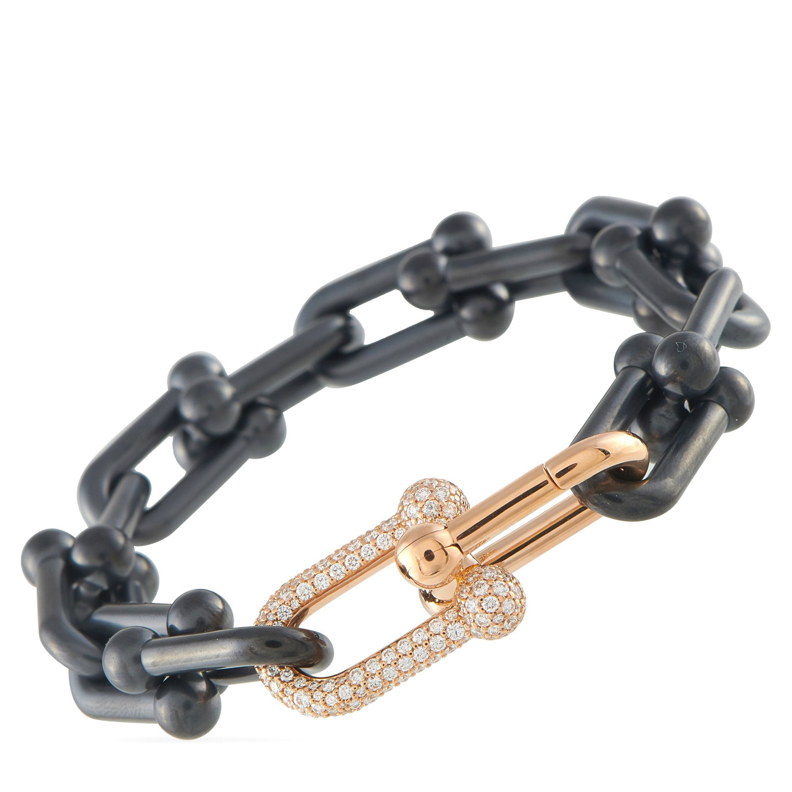 Tiffany & CO. HardWear 18K Rose Gold and Titanium 1.60ct Diamond Bracelet: This Tiffany & Co. HardWear Link bracelet offers an elegant array of colors, textures, and materials. Incredibly bold, Titanium gauge links are juxtaposed with two links crafted from opulent 18K Rose 
