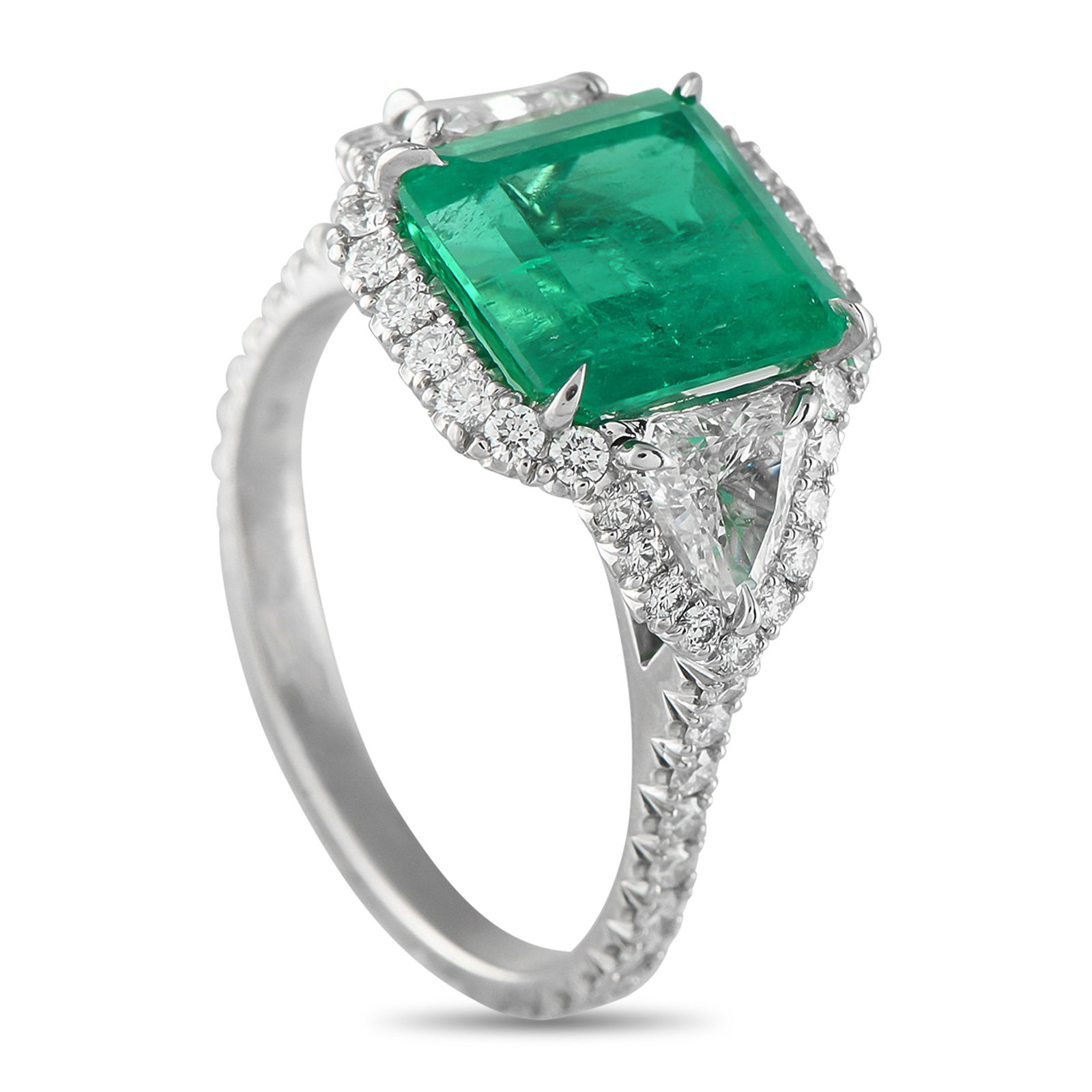 Kwiat Platinum 1.0ct Diamond and Emerald Ring: Add a stylish pop of color to any ensemble with this Kwiat ring. Simple and elegant, the Platinum setting is elevated by sparkling Diamonds totaling 1.0 carats. A vibrant 3.85 carat Emerald makes a st