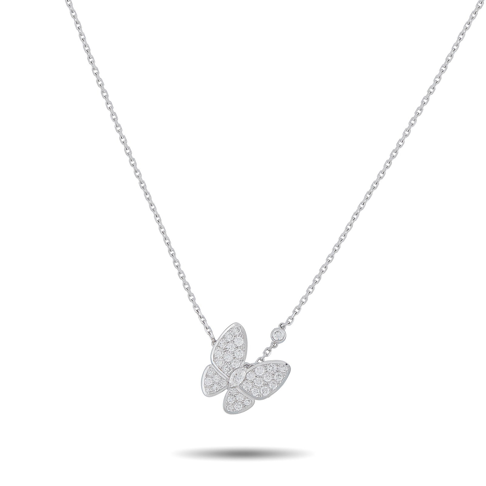 Van Cleef & Arpels Two Butterfly 18K White Gold 0.88ct Diamond Necklace: Delicate and instantly enchanting, this Van Cleef & Arpels Two Butterfly necklace features an asymmetrical design meant to capture the movement of butterflies in flight. Diamonds with a total weight o
