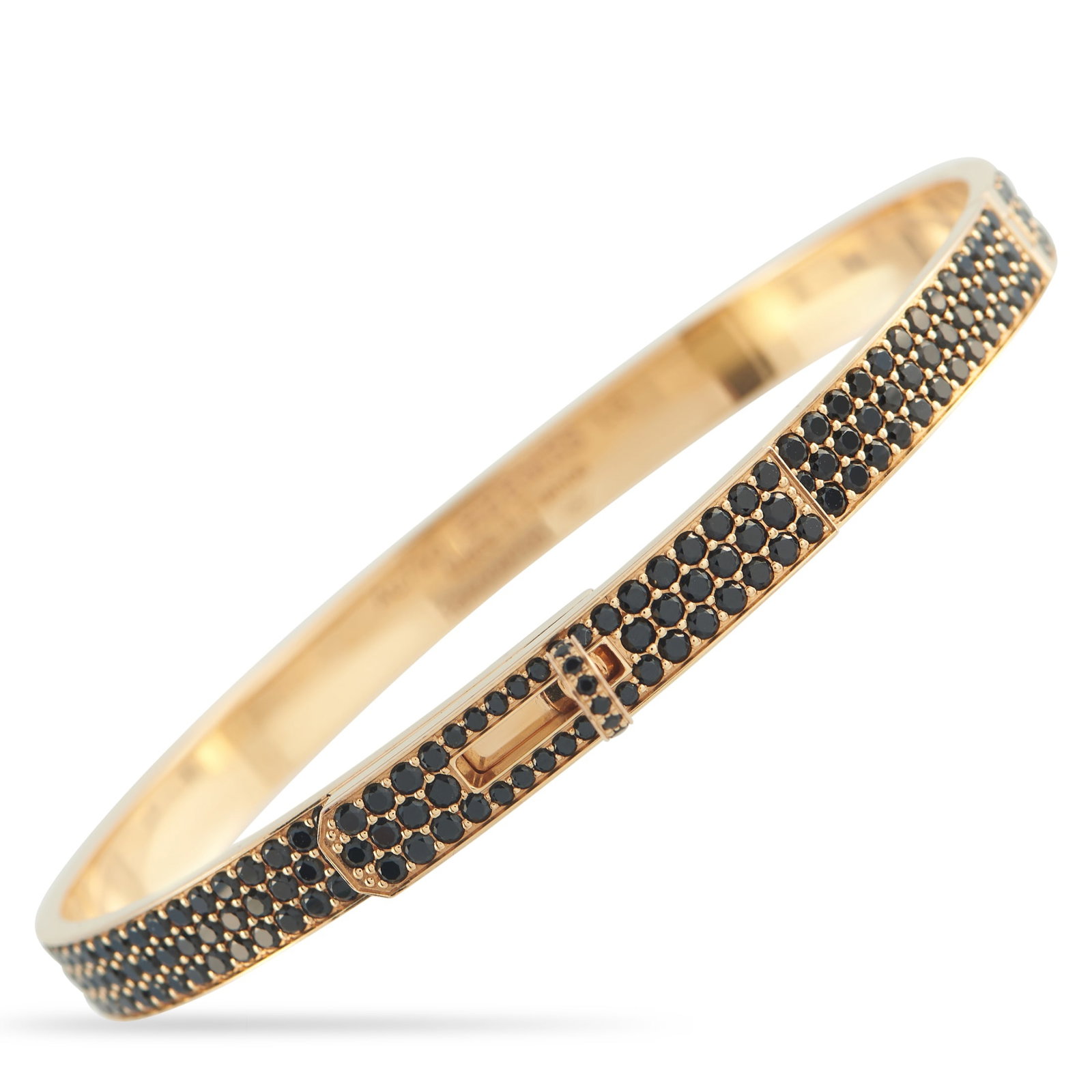 Hermes Kelly 18K Rose Gold Spinel Bracelet: Inset Spinel gemstones add extra color, texture, and dimension to this classic Hermes Kelly bracelet. Beautiful no matter if it’s worn alone or paired with other luxury pieces, this bangle bracelet 