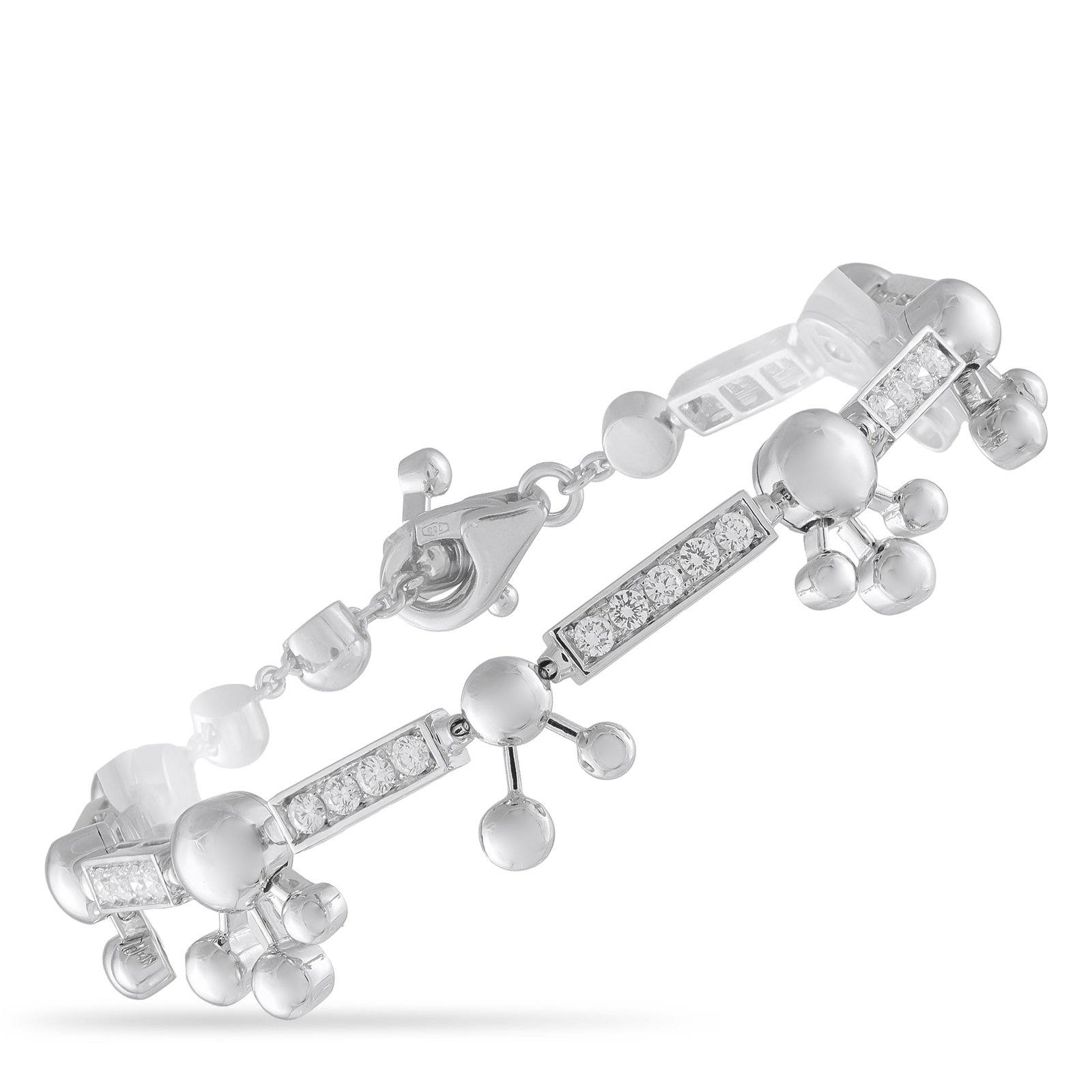 Bvlgari Astrale 18K White Gold 1.45ct Diamond Bracelet: With motifs that evoke constellations, this Bvlgari Astrale bracelet is a wearable work of art. This sleek, sophisticated design includes sparkling Diamonds with a total weight of 1.45 carats, which e