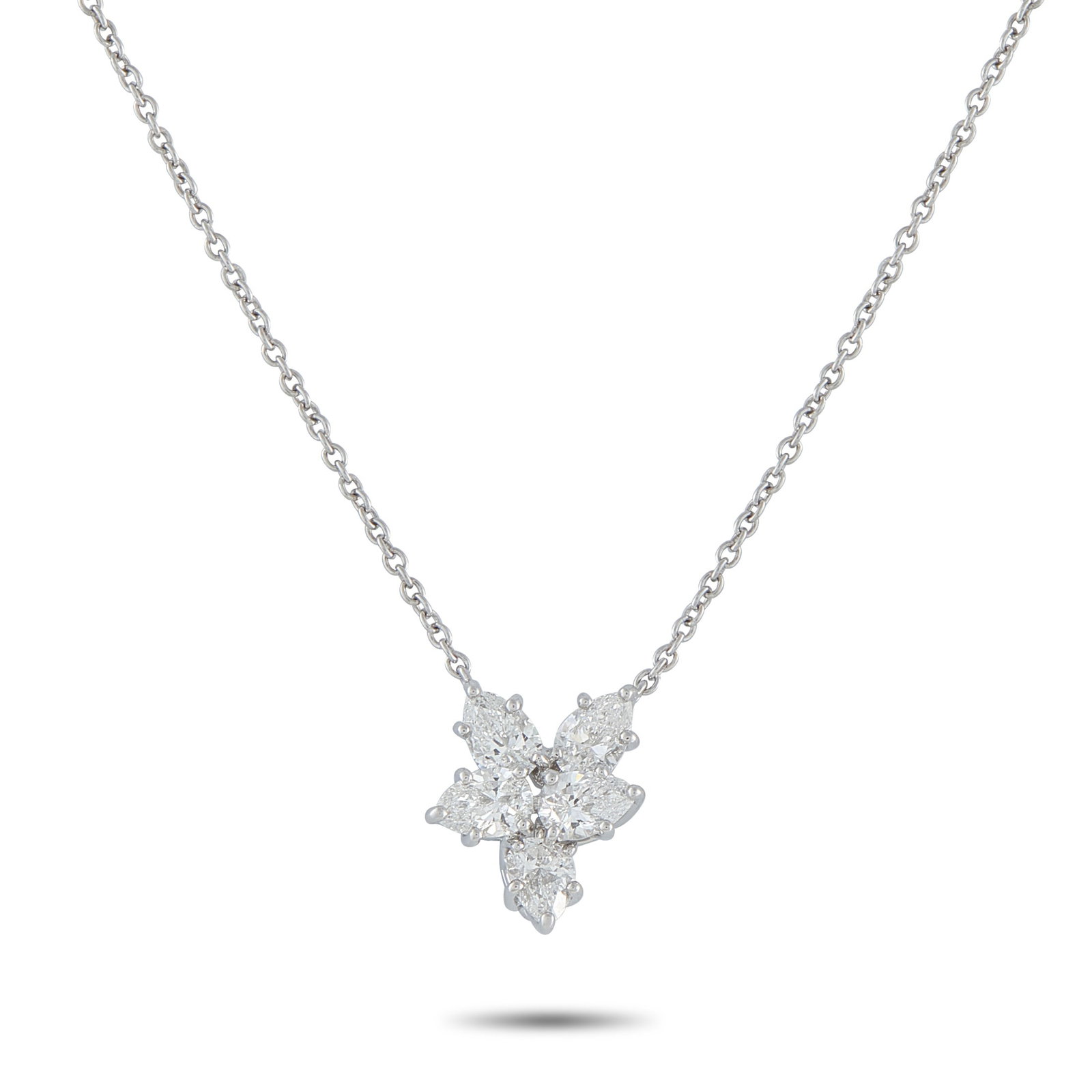 Harry Winston Platinum 1.0ct Diamond Necklace: Add timeless luxury to any ensemble with this classic Harry Winston necklace. A cluster of Diamonds with a total weight of 1.0 carats effortlessly catch the light along with your every movement. Set i