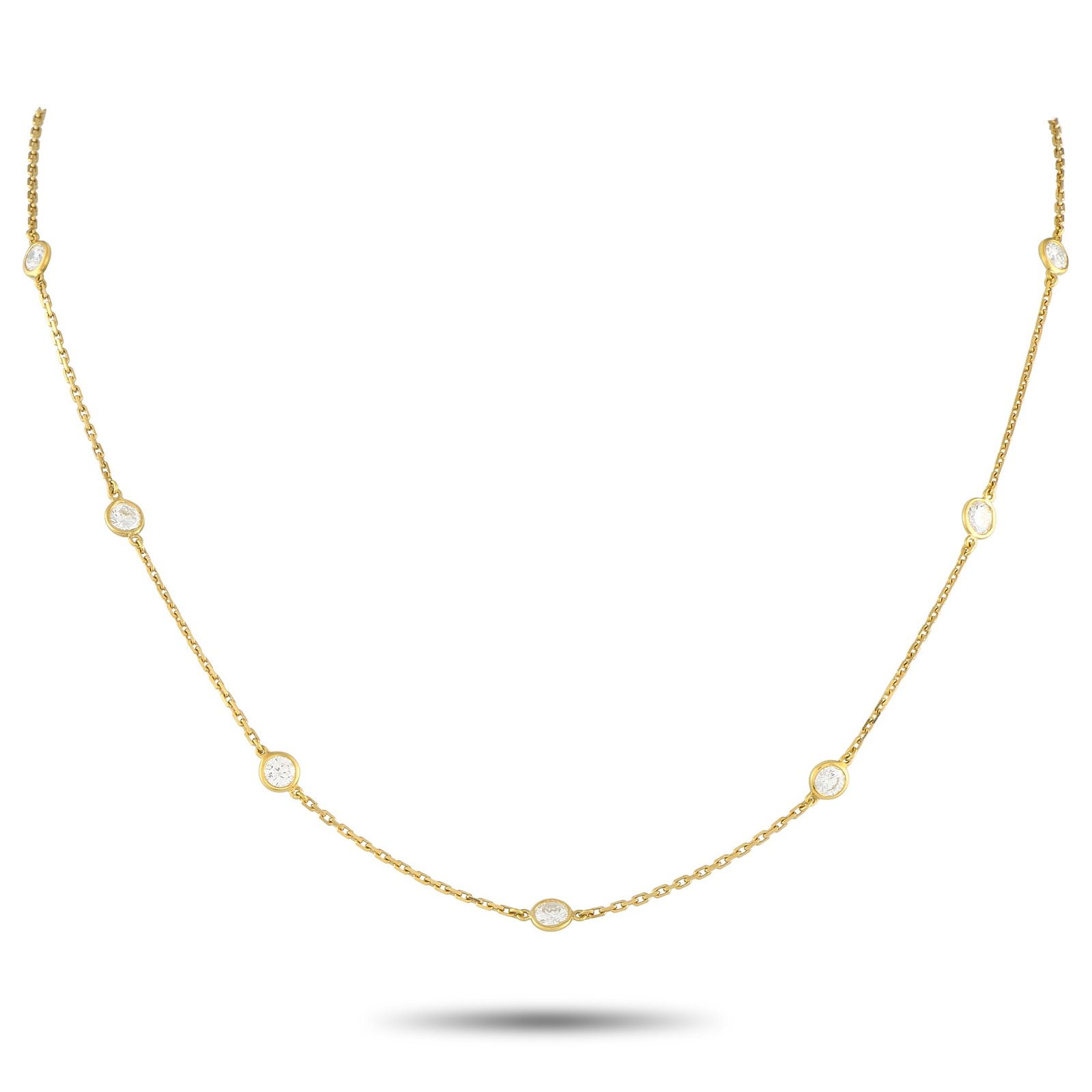Tiffany & CO. Elsa Peretti Diamonds by the Yard 18K Yellow Gold 2.50ct Diamond Necklace: From Tiffany’s Diamonds by the Yard collection, this necklace designed by Elsa Peretti features an 18K yellow gold cable chain punctuated by bezel-set round brilliant diamonds totaling 2.50 carats. 