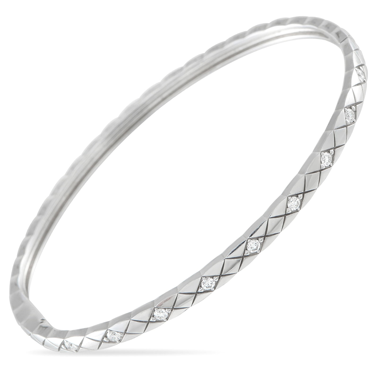 Chanel 18K White Gold 0.36ct Diamond Bangle: This Chanel bangle bracelet will add polish to any ensemble. Diamonds with a total weight of 0.36 carats elevate the 18K White Gold setting, which comes to life thanks to a simple lattice pattern. It 