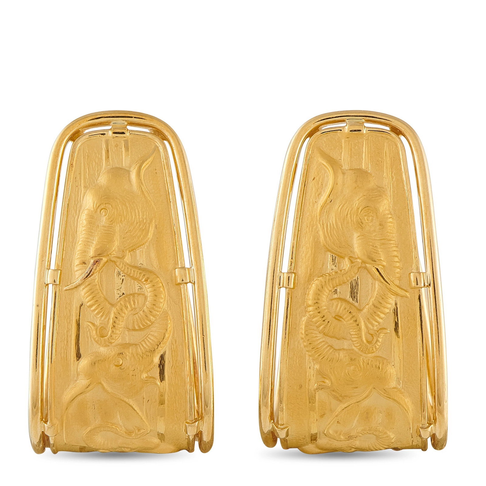 Carrera Y Carrera 18K Yellow Gold Elephant Earrings: Elephants with interlocking trunks add charm and elegance to these exquisite Carrera y Carrera earrings. Set in 18K Yellow Gold, each earring features a curved design and measures 1.38” long by 