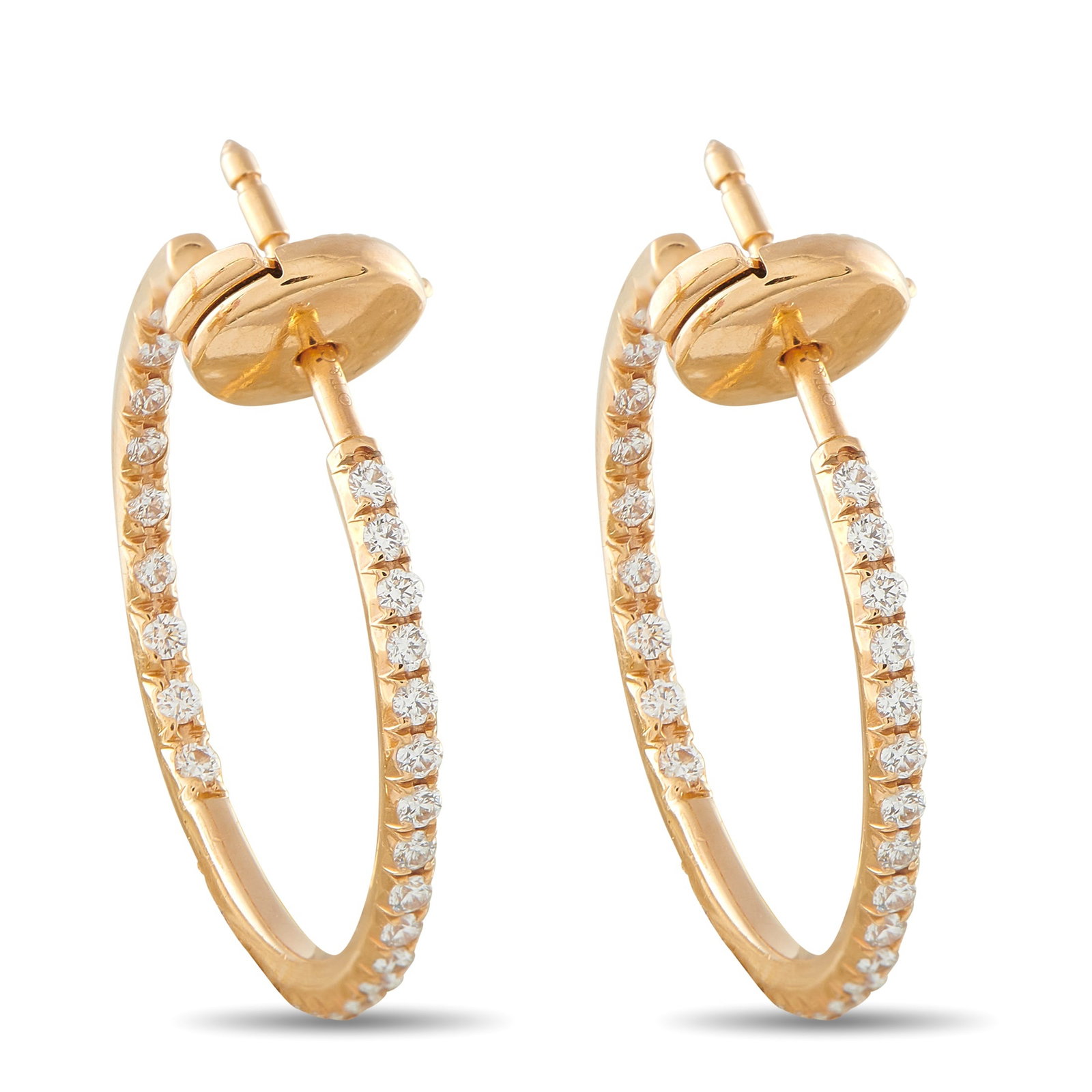 Tiffany & CO. Metro 18K Yellow Gold 0.50ct Diamond Hoop Earrings: Elegant and uncomplicated, these Tiffany & Co. Metro hoop earrings were designed to catch the light from every angle. Sparkling round-cut Diamonds with a total weight of 0.50 carats cover the 18K Yell