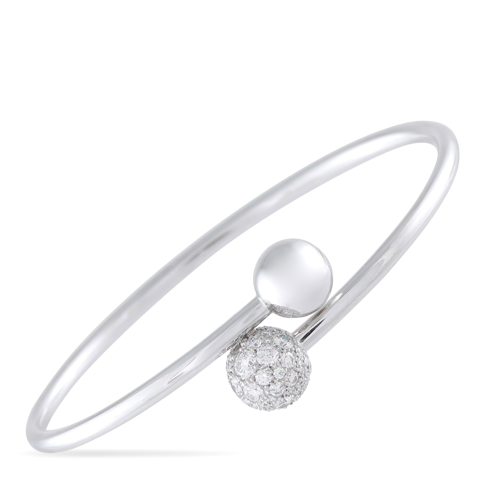 Tiffany & CO. HardWear 18K White Gold 0.73ct Diamond Bangle: This Tiffany & Co. HardWear bangle bracelet exudes understated elegance. A piece that will instantly elevate any ensemble, sparkling Diamonds totaling 0.73 carats accent the sleek 18K White Gold setti