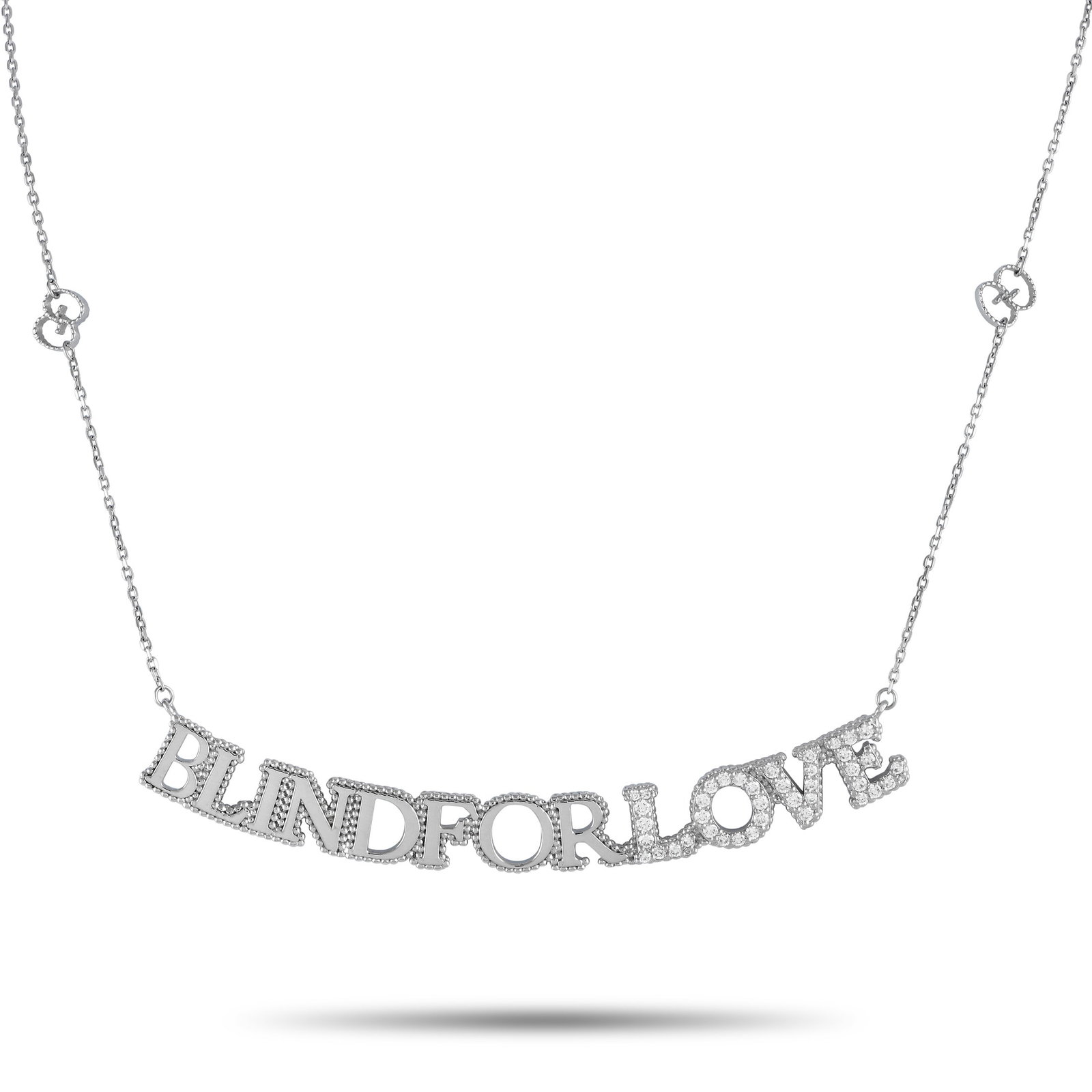 Gucci Blind for Love 18K White Gold 0.45ct Diamond Script Necklace: This Gucci necklace is the perfect finishing touch to a statement-making outfit. It delivers a real message with its script pendant saying “Blind for Love.” Gucci’s “Blind for Love” 