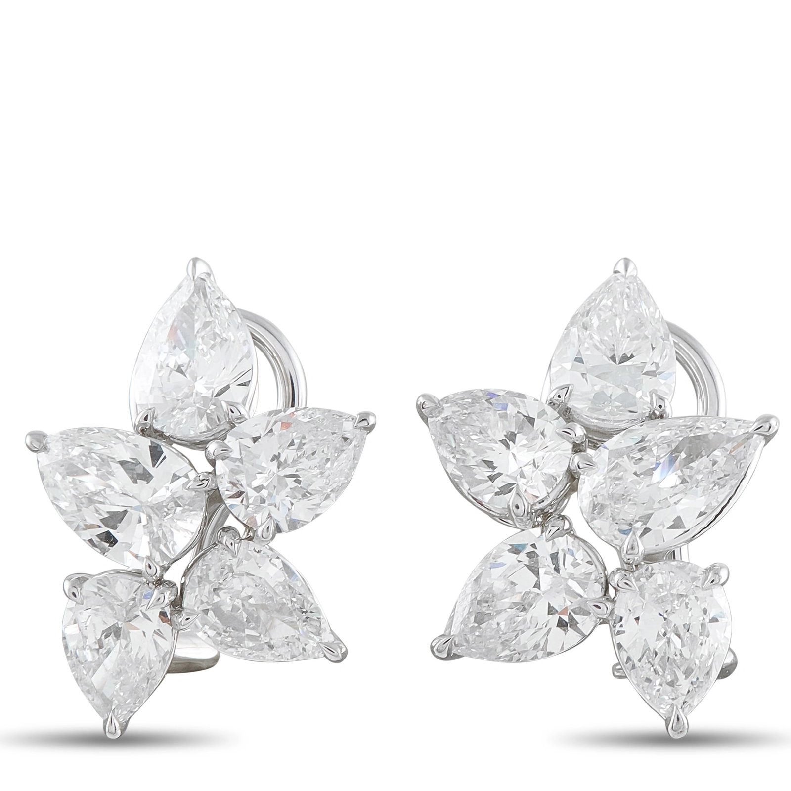 18K White Gold 7.0ct Diamond Cluster Earrings: This estate pair of earrings is crafted in 18K white gold and features pear-shaped diamonds arranged in a floral cluster design, totaling approximately 7.0 carats. Each earring measures approximately 