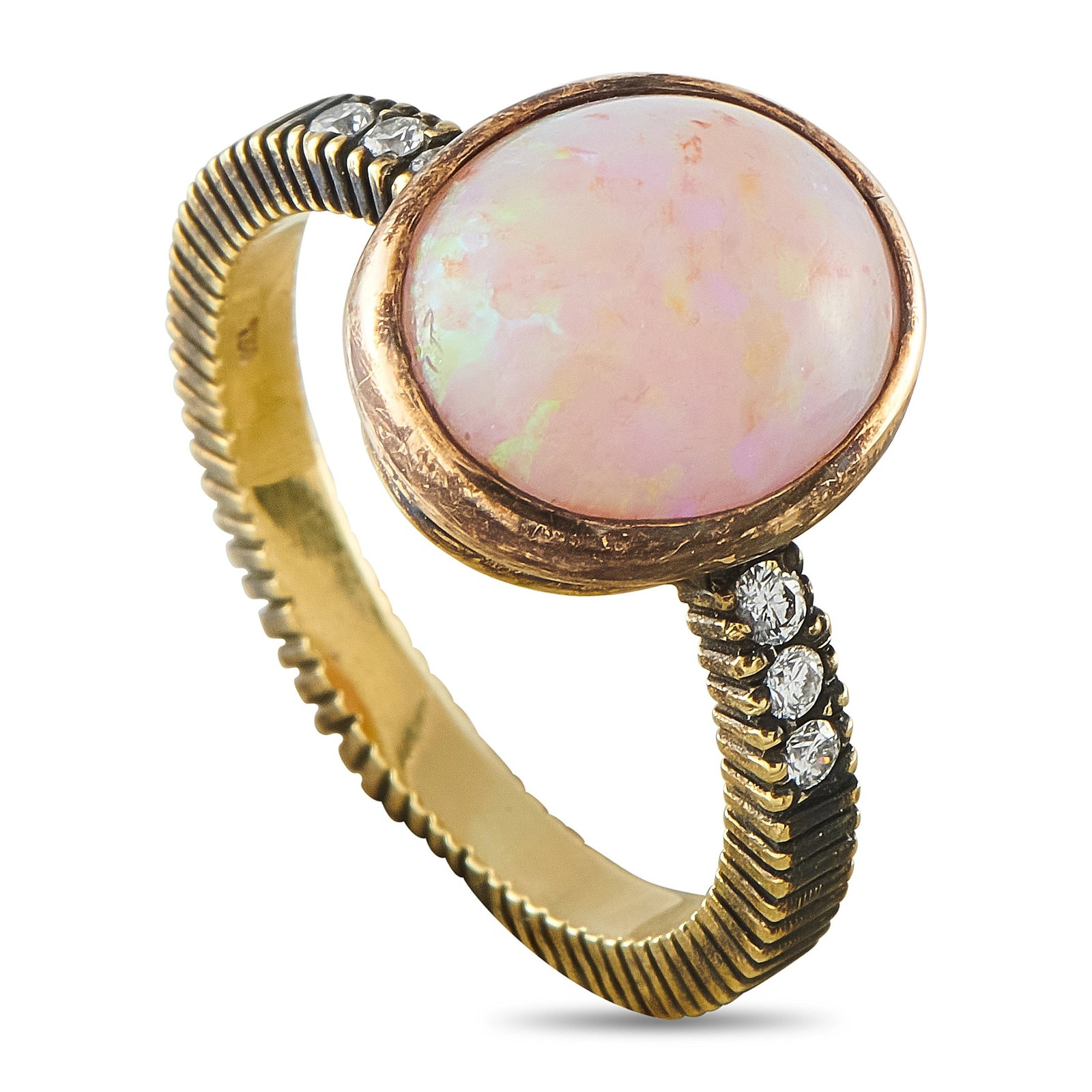 18K Yellow Gold 0.06ct Diamond and Opal Ring: This estate ring is crafted in 18K yellow gold and centers on a 4.0 carat cabochon Australian opal displaying vibrant play-of-color, accented by round diamonds totaling approximately 0.06 carats set i
