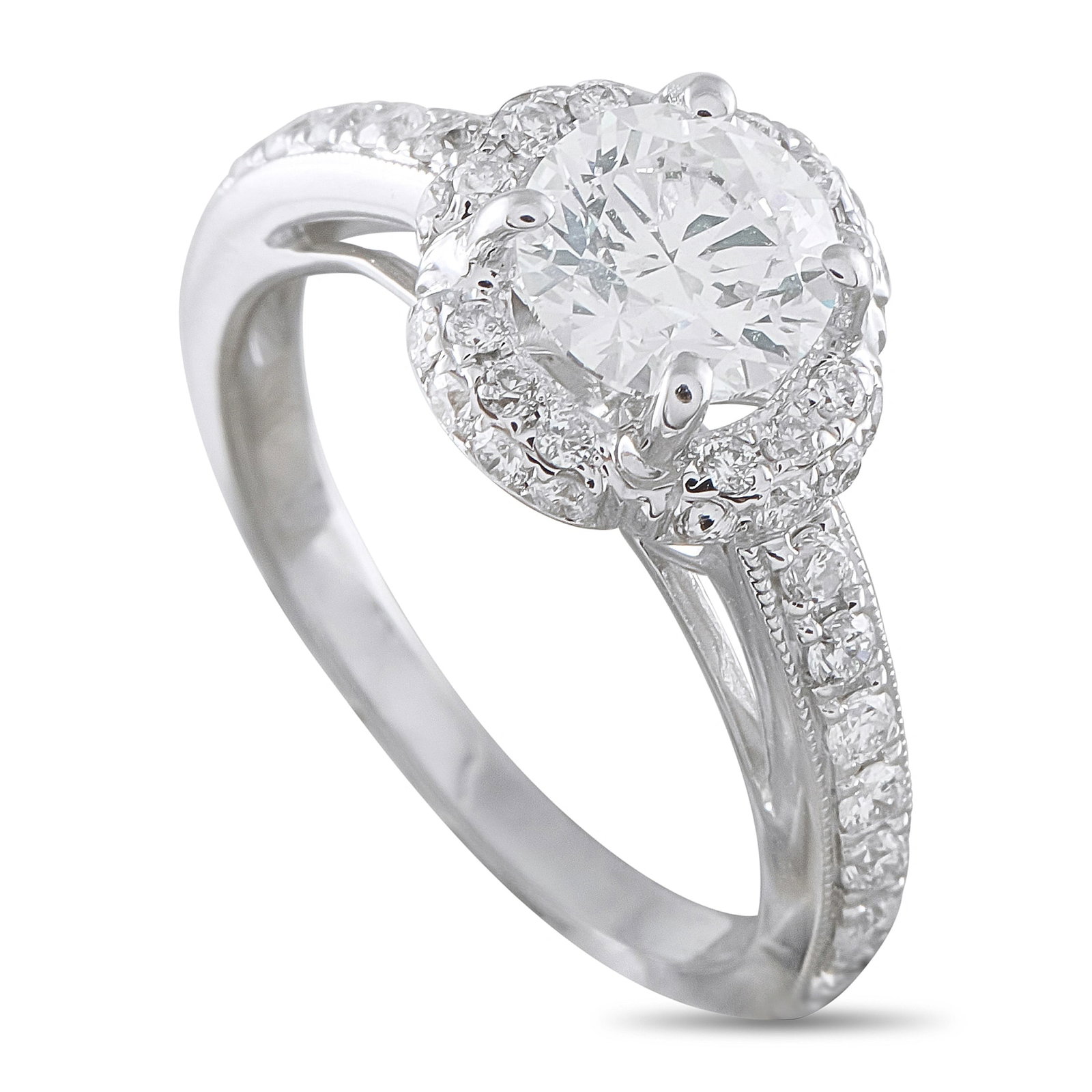 18K White Gold 1.25ct Diamond Halo Engagement Ring: This estate engagement ring is crafted in 18K white gold and centers on a round brilliant-cut diamond framed by a sparkling diamond halo, with additional round diamonds accenting the shank. The total 