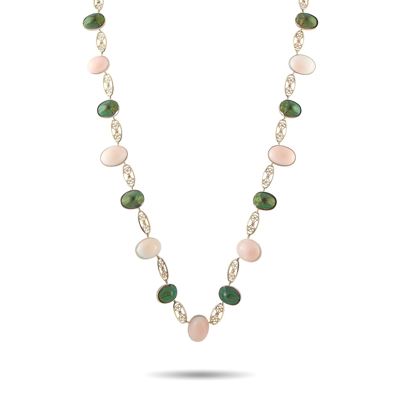 Antique 10K Rose Gold Genuine Scarab and Coral Necklace: This vintage necklace is crafted in 10K rose gold and alternates genuine iridescent scarab beetle elements with oval cabochon-cut coral stones, joined by ornate rope-twist gold links. The necklace mea