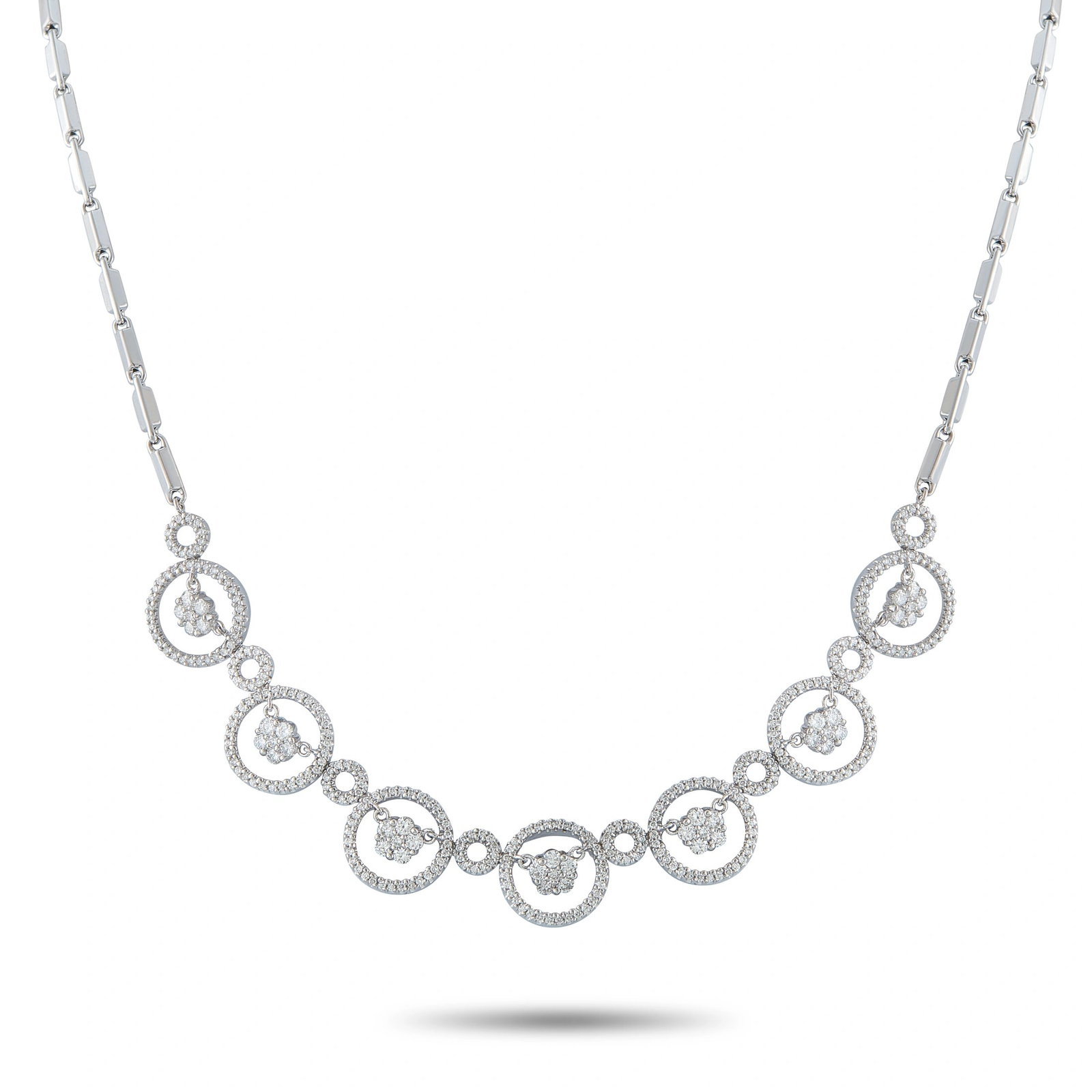 18K White Gold 2.45ct Diamond Circle Link Necklace: This eye-catching necklace is crafted in 18K white gold featuring a series of graduated pave diamond-set open circles, each centered with a dangling floral diamond cluster, joined by smaller diamond-s
