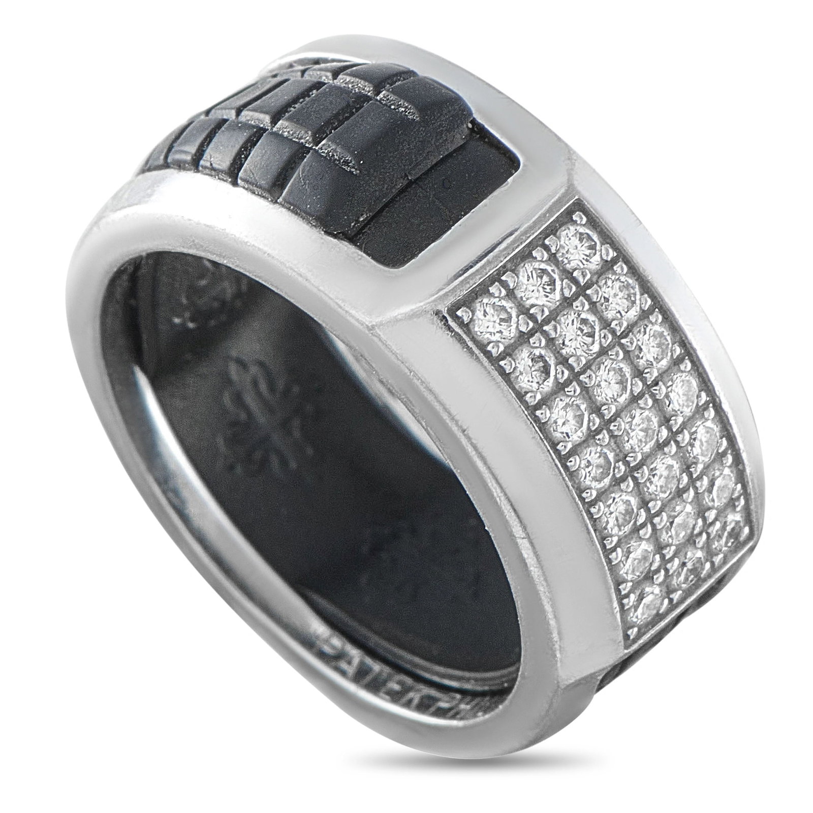 Patek Philippe Aquanaut Luce 18K White Gold Diamond Ring: This sporty yet refined ring from Patek Philippe’s Aquanaut Luce collection is crafted in 18K white gold with a black textured inlay evoking the brand’s signature rubber strap pattern. The wide ba