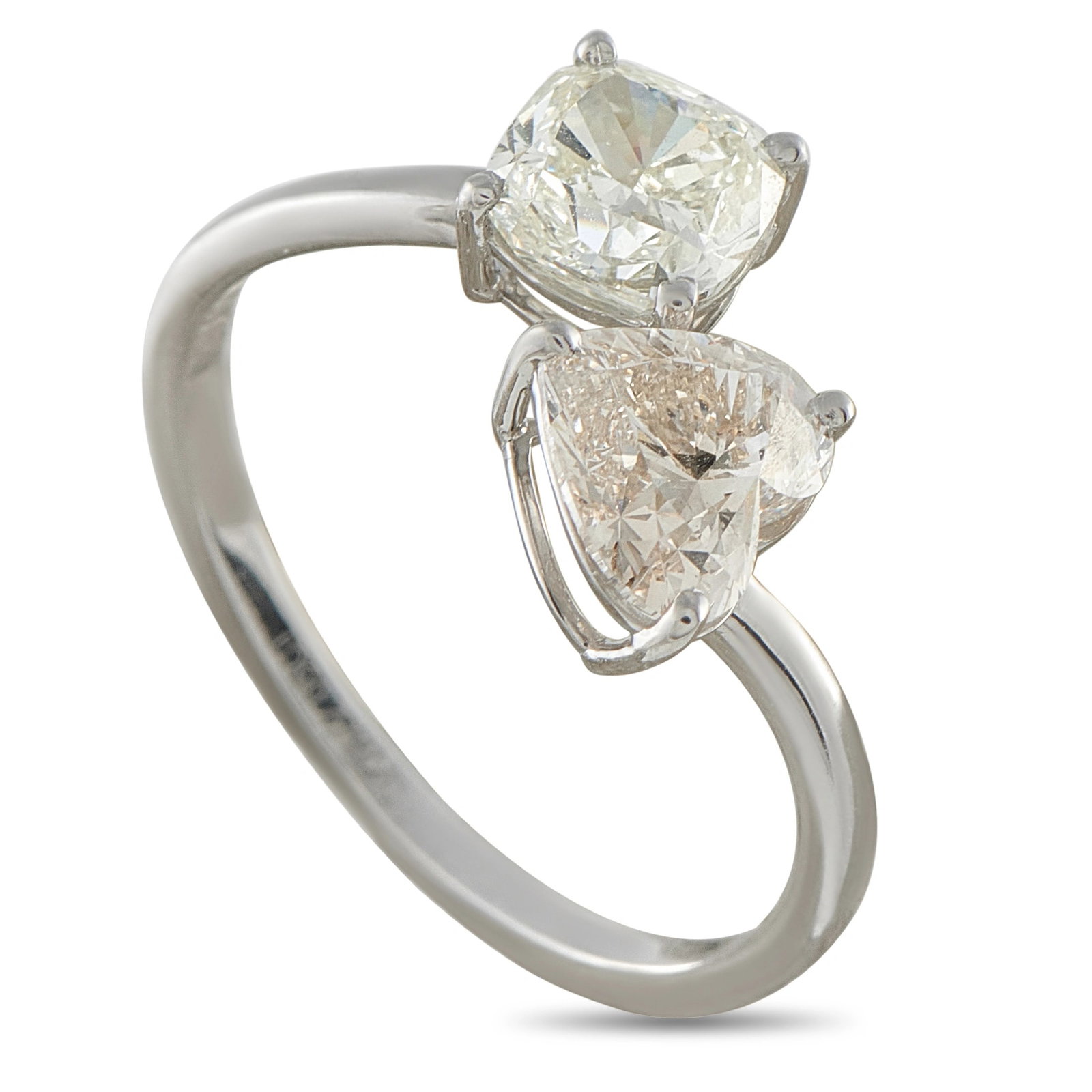 Platinum 2.05ct Diamond Toi et Moi Ring: This elegant platinum toi et moi ring pairs a heart shape diamond weighing approximately 1.03 carats with a cushion cut diamond weighing approximately 1.02 carats, set side by side in a crossover moun