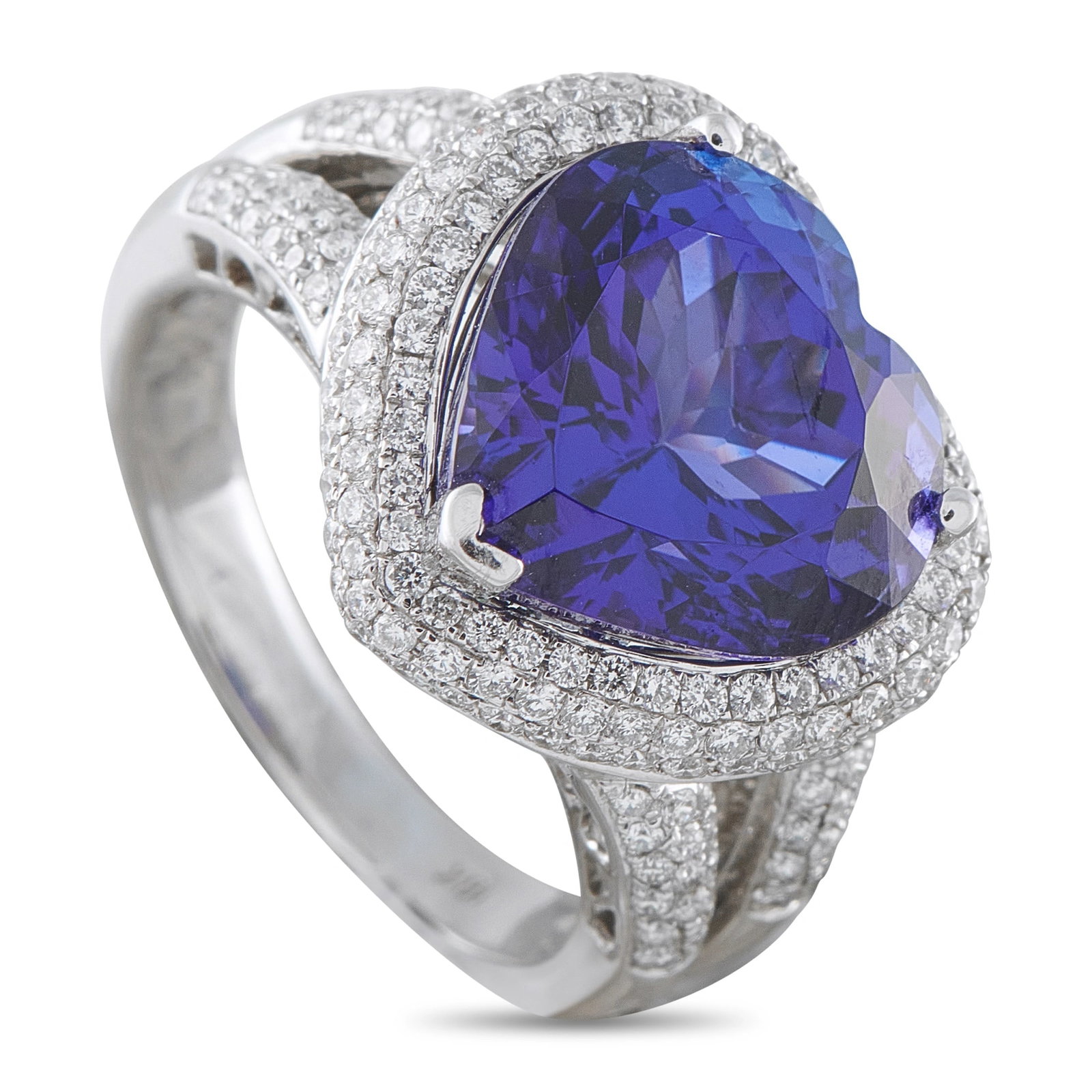 18K White Gold 0.95ct Diamond and Tanzanite Heart Ring: A breathtaking cocktail ring in 18K white gold, centering a magnificent 7.58 carat heart-shaped tanzanite of vivid blue-violet hue — one of the rarest gemstones in the world, found exclusively near 