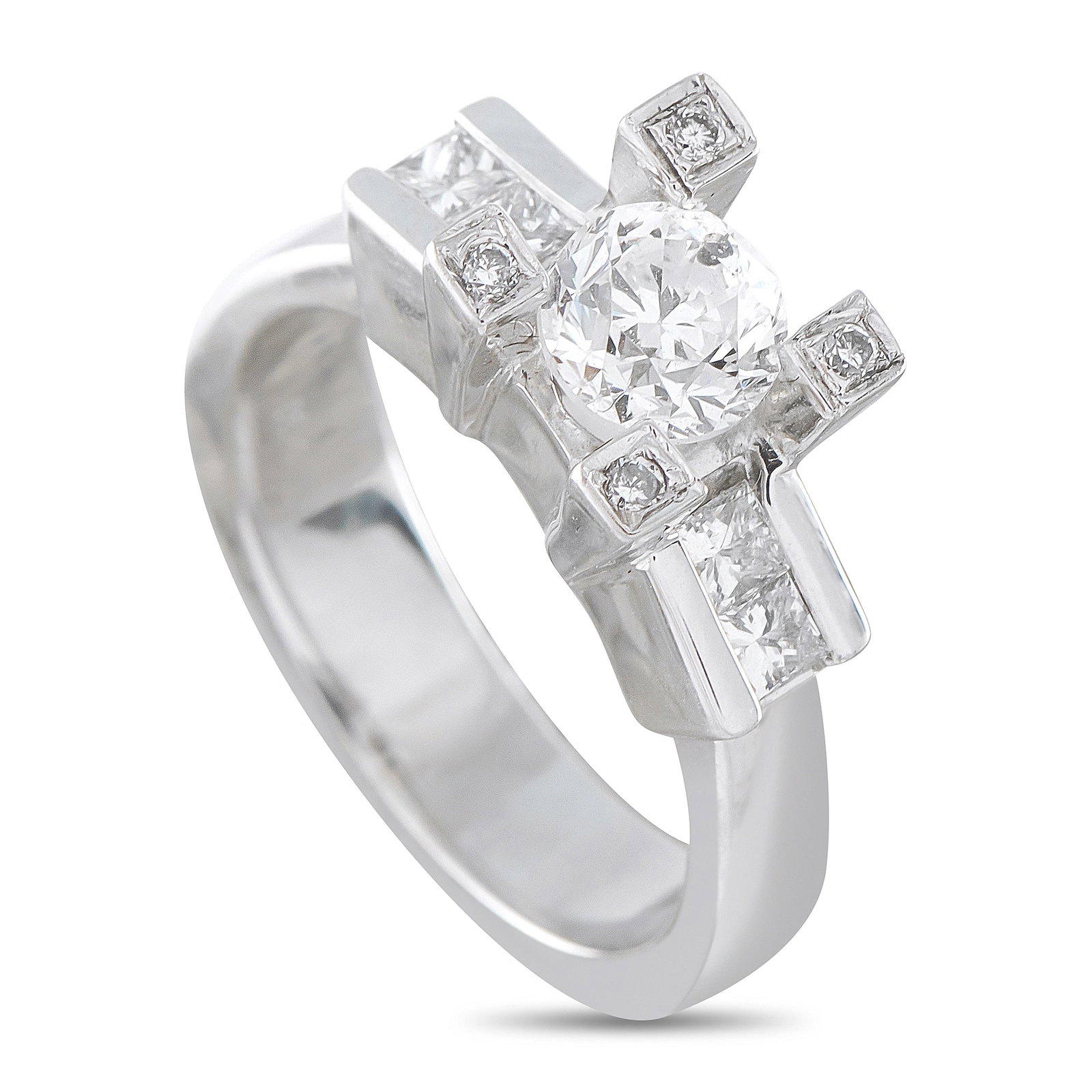 18K White Gold 1.36ct Diamond Ring: This bold and architecturally striking 18K white gold diamond ring makes an unforgettable statement with its geometric, multi-level design. At the center sits a round brilliant diamond of 0.92 carats,