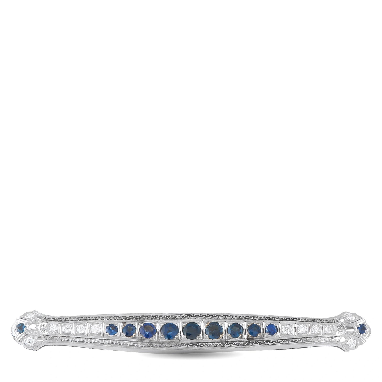 18K White Gold 0.60ct Diamond and Sapphire Art Deco Bar Brooch: An elegant Art Deco bar brooch in 18K white gold, featuring a center row of round blue sapphires totaling 2.0 ct flanked by round brilliant diamonds totaling 0.60 ct. Intricate milgrain engraving and 