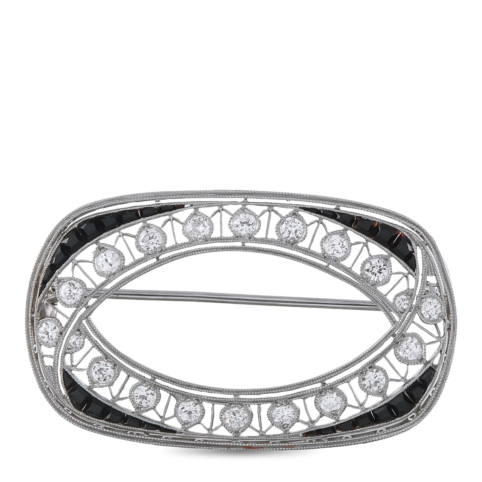 Platinum 0.80ct Diamond and Sapphire Brooch: A detailed Platinum setting makes this luxury brooch simply unforgettable. Round-cut Diamonds with a total weight of 0.80ct carats are highlighted by this piece’s breathtaking negative space details