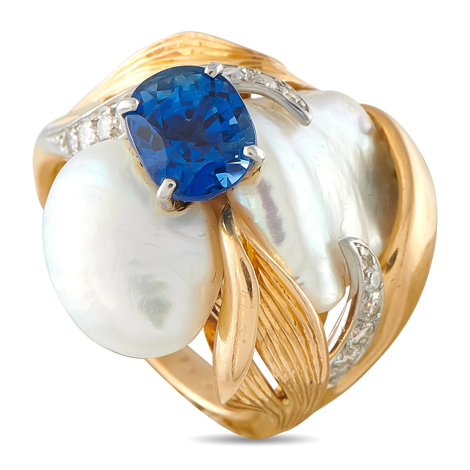 William Ruser Vintage Platinum and 14K Yellow Gold 0.16ct Diamond, Sapphire, and Baroque Pearl Ring: An exceptional cocktail ring in platinum and 14K yellow gold, centering a cushion-cut blue sapphire of 2.35 carats alongside a lustrous baroque pearl, accented by round brilliant diamonds totaling 0.1