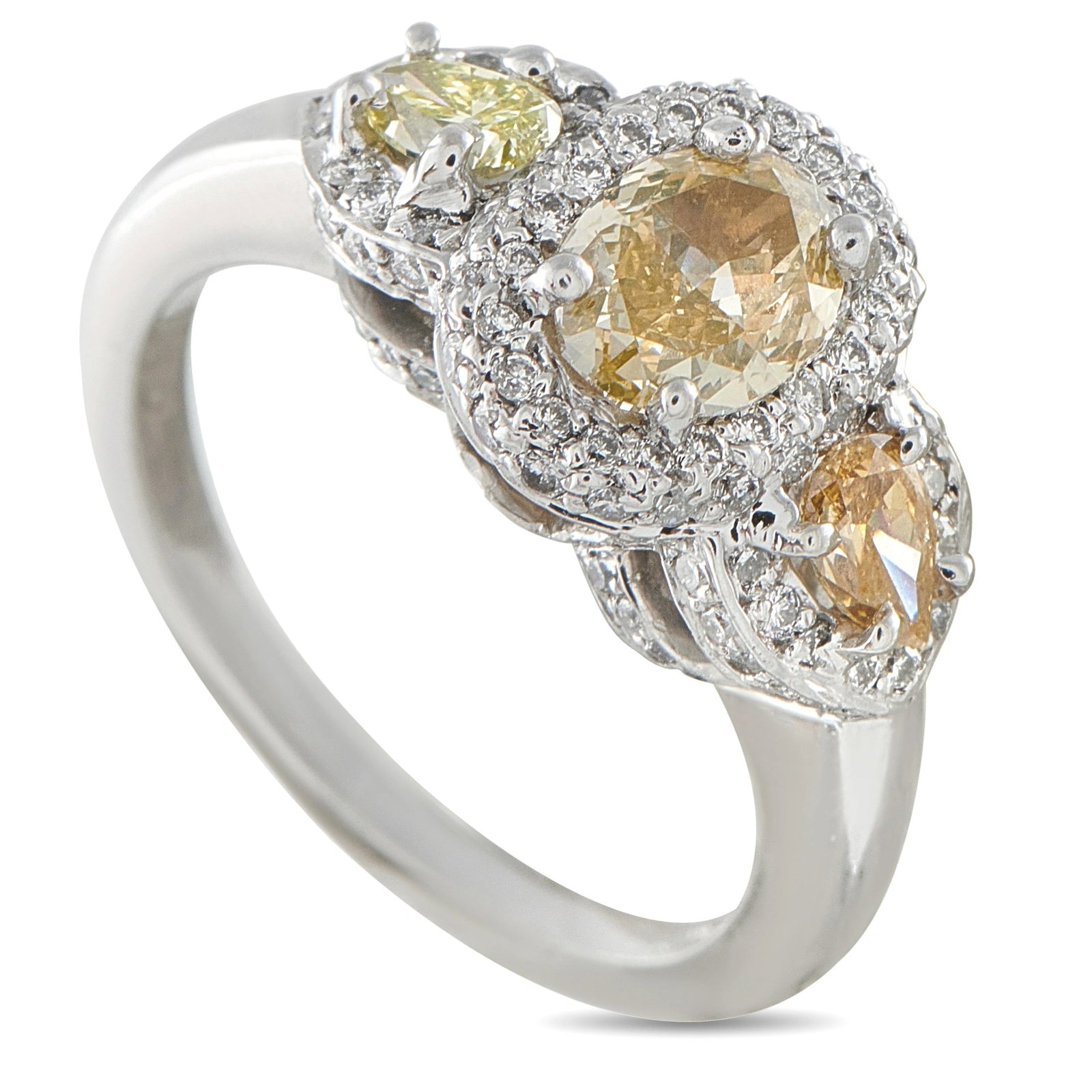Platinum 1.71ct Diamond Three-Stone Halo Ring: An extraordinary estate platinum ring centered on a 0.79-carat oval fancy yellow diamond, flanked by two matching pear-shaped fancy yellow diamonds totaling 0.48 carats — all three stones displaying