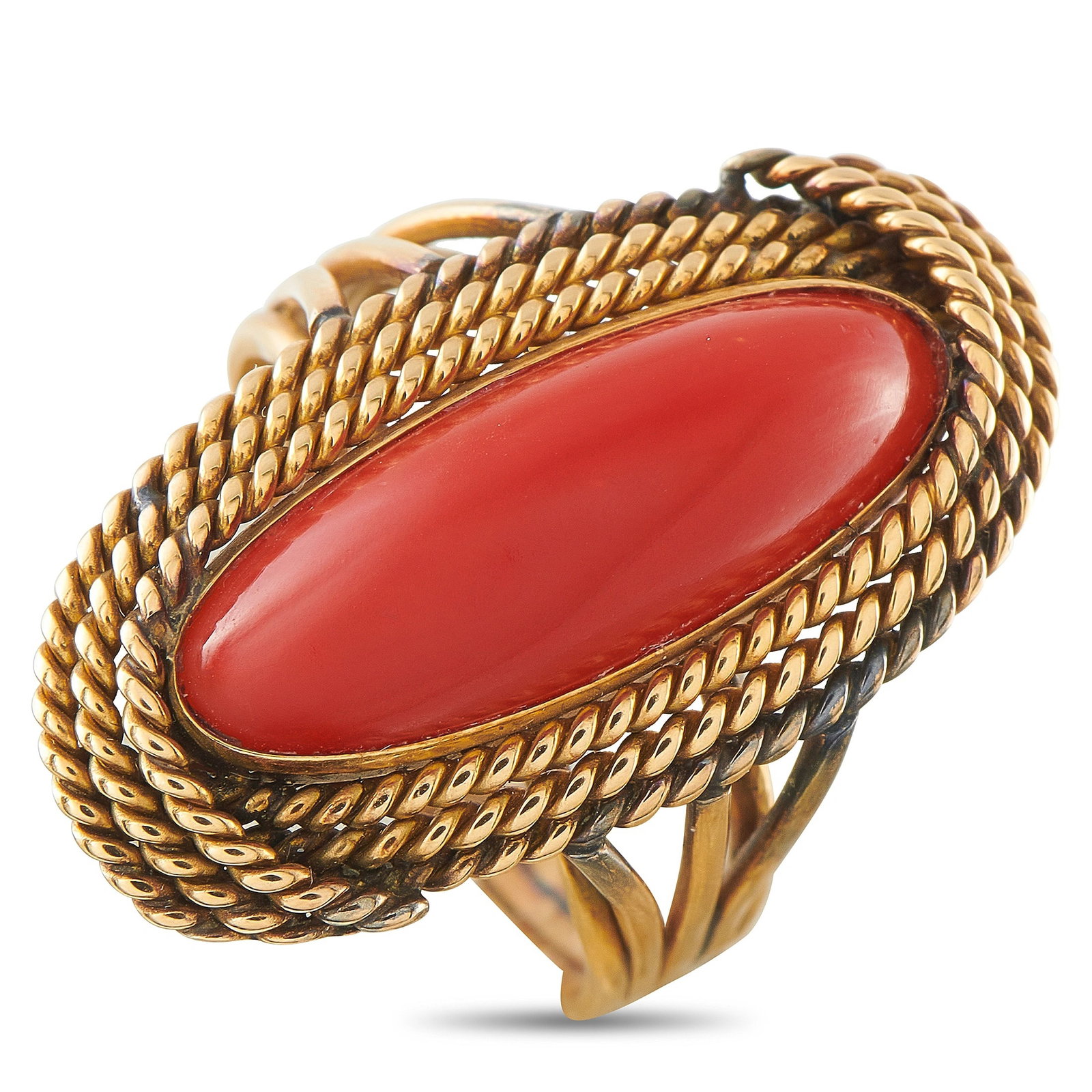 Vintage 14K Yellow Gold Coral Cocktail Ring: A bold vintage cocktail ring in 14K yellow gold, centering an elongated oval coral cabochon in a rich red-orange hue. The cabochon is framed by a double twisted rope border, lending an artisanal, text