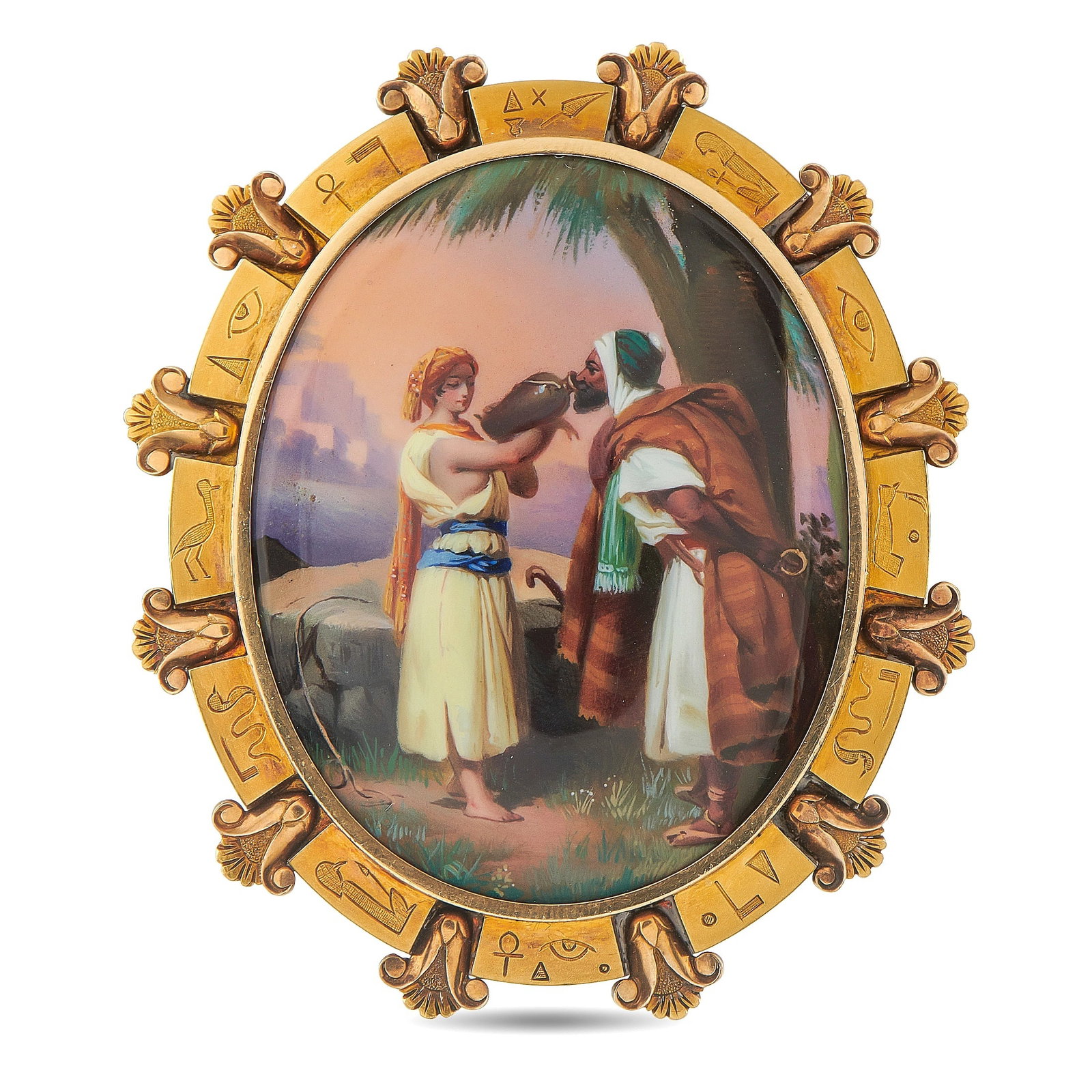 18K Yellow Gold Victorian Egyptian Revival Hand-Painted Enamel Brooch: An exceptional Victorian Egyptian Revival brooch in 18K yellow gold, centering an exquisitely hand-painted enamel miniature depicting an orientalist scene of figures in traditional dress beside a palm