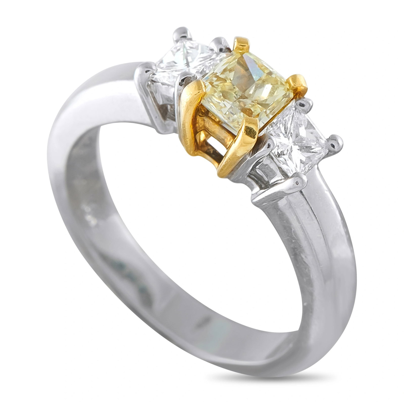 Platinum and 18K Yellow Gold 0.82ct Diamond Three-Stone Ring: This luxury ring provides a stunning twist on tradition. The classic three-stone setting comes to life thanks to a 0.50 carat Fancy Yellow Diamond center stone and white Diamond accents totaling 0.32 