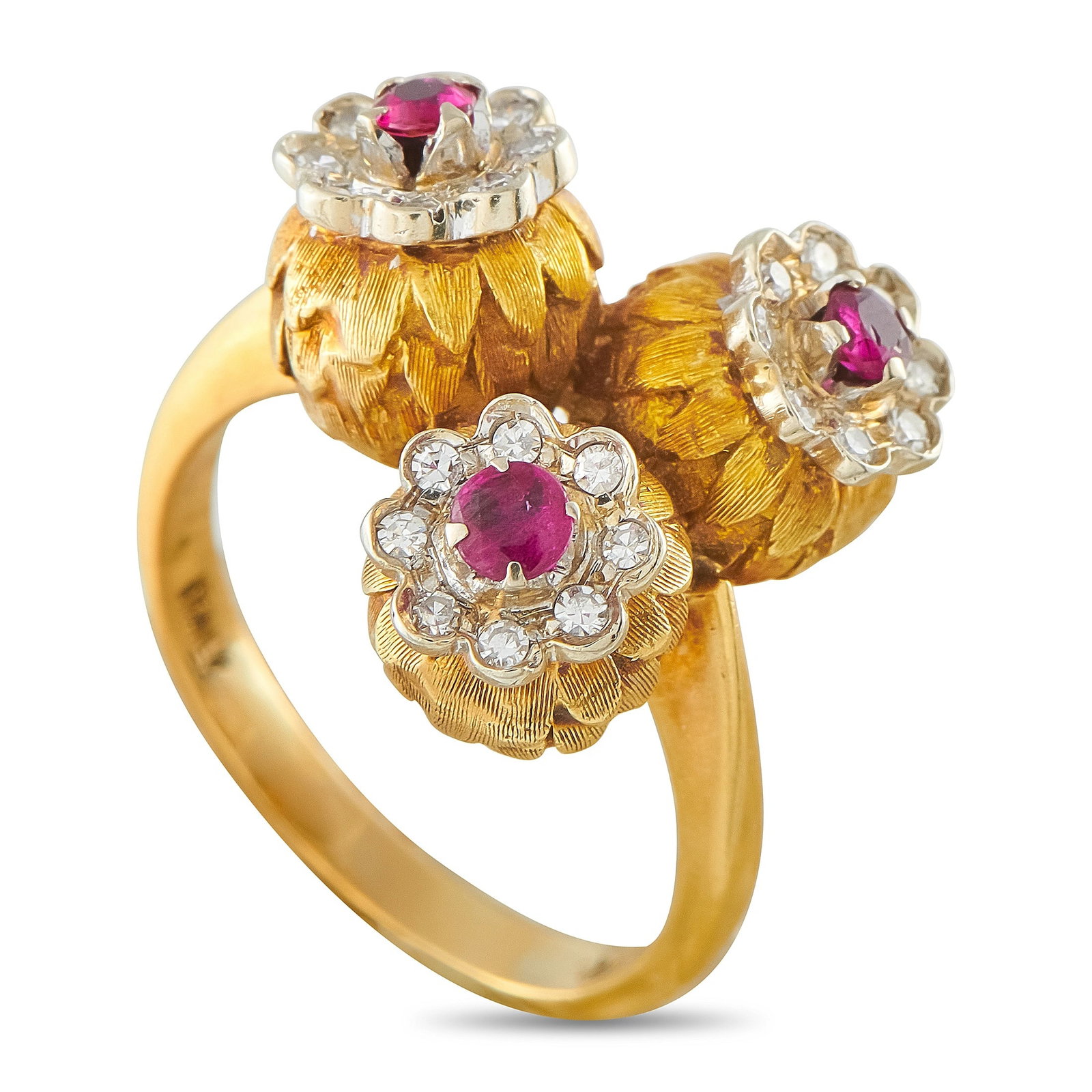 18K Yellow Gold Diamond and Ruby Triple Flower Ring: A captivating and sculptural ring in 18K yellow gold, featuring three textured floral clusters each centering a vivid round ruby surrounded by a halo of round brilliant diamonds. The richly worked gol