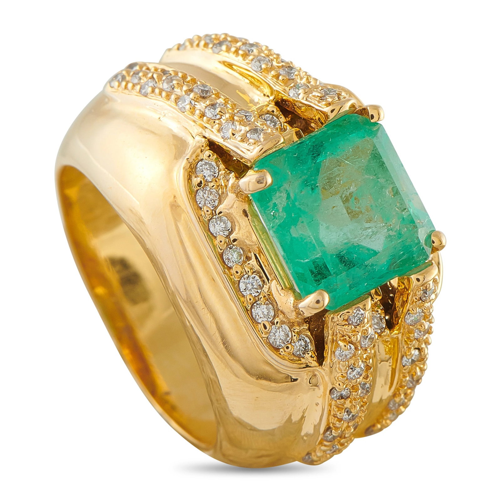14K Yellow Gold 0.50ct Diamond and Emerald Ring: A bold and vibrant ring in 14K yellow gold, centering a lush emerald totaling 4.0 ct, accented by round brilliant diamonds totaling 0.50 ct. The vivid green emerald commands attention while the surrou