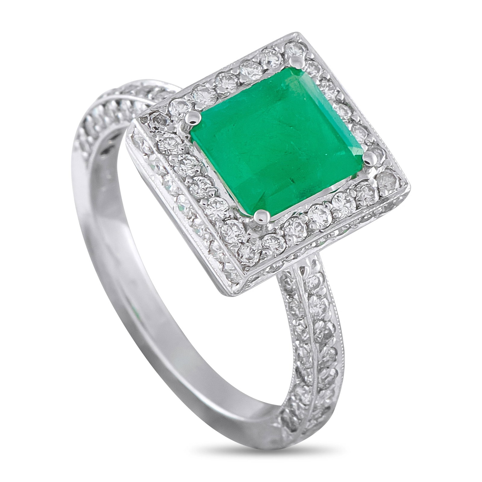 Platinum 0.40ct Diamond and Emerald Ring: An elegant halo ring in platinum, centering a vibrant emerald-cut emerald of approximately 1.20 ct, framed by a square halo of round brilliant diamonds. The diamond-set shank features additional pavé