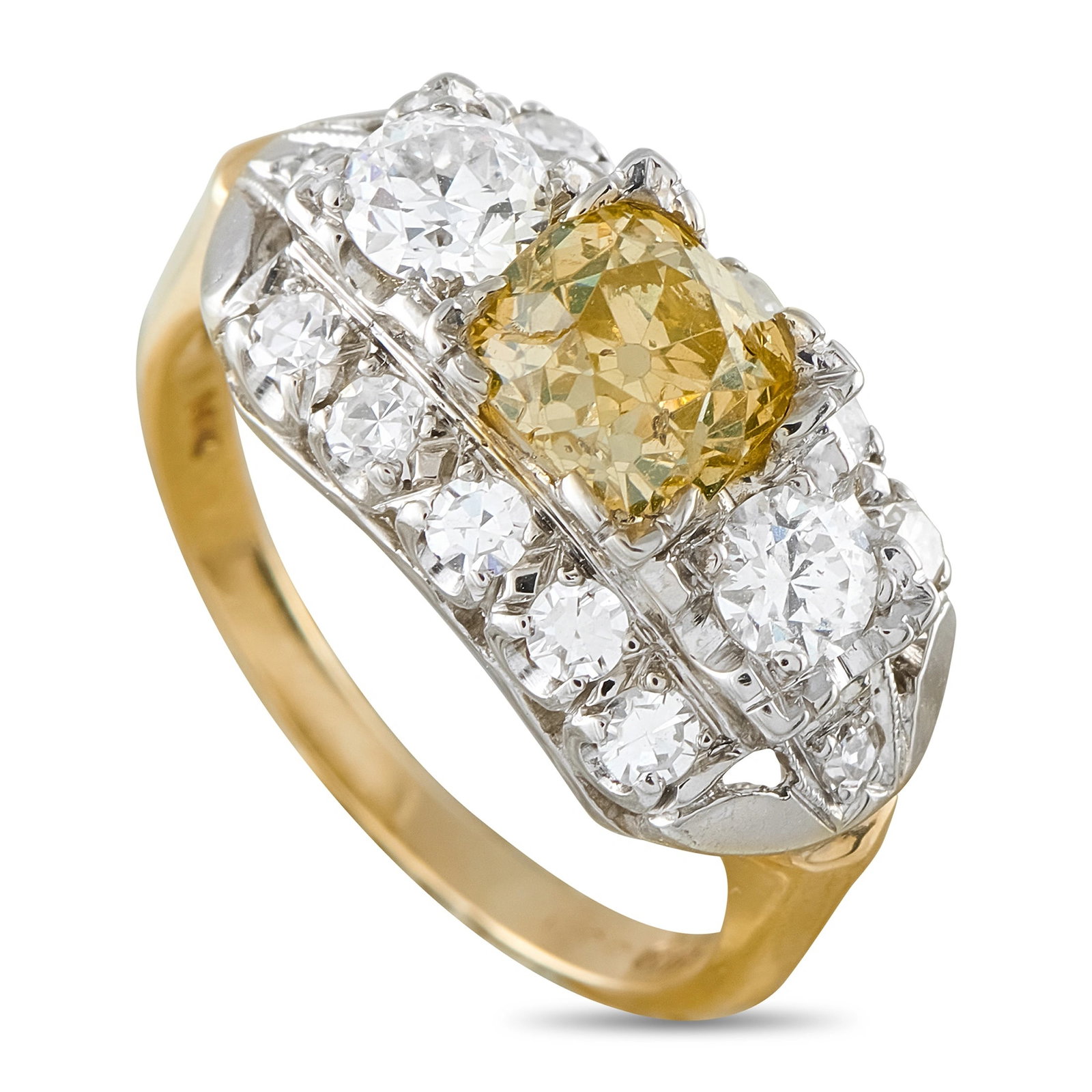 Antique 14K Yellow Gold 2.10ct Fancy Yellow and White Diamond Cocktail Ring: An extraordinary antique cocktail ring in 14-karat yellow gold, centered on a 1.30 ct old mine-cut fancy yellow diamond set within a horizontal band mounting flanked by white diamonds totaling 0.80 ct